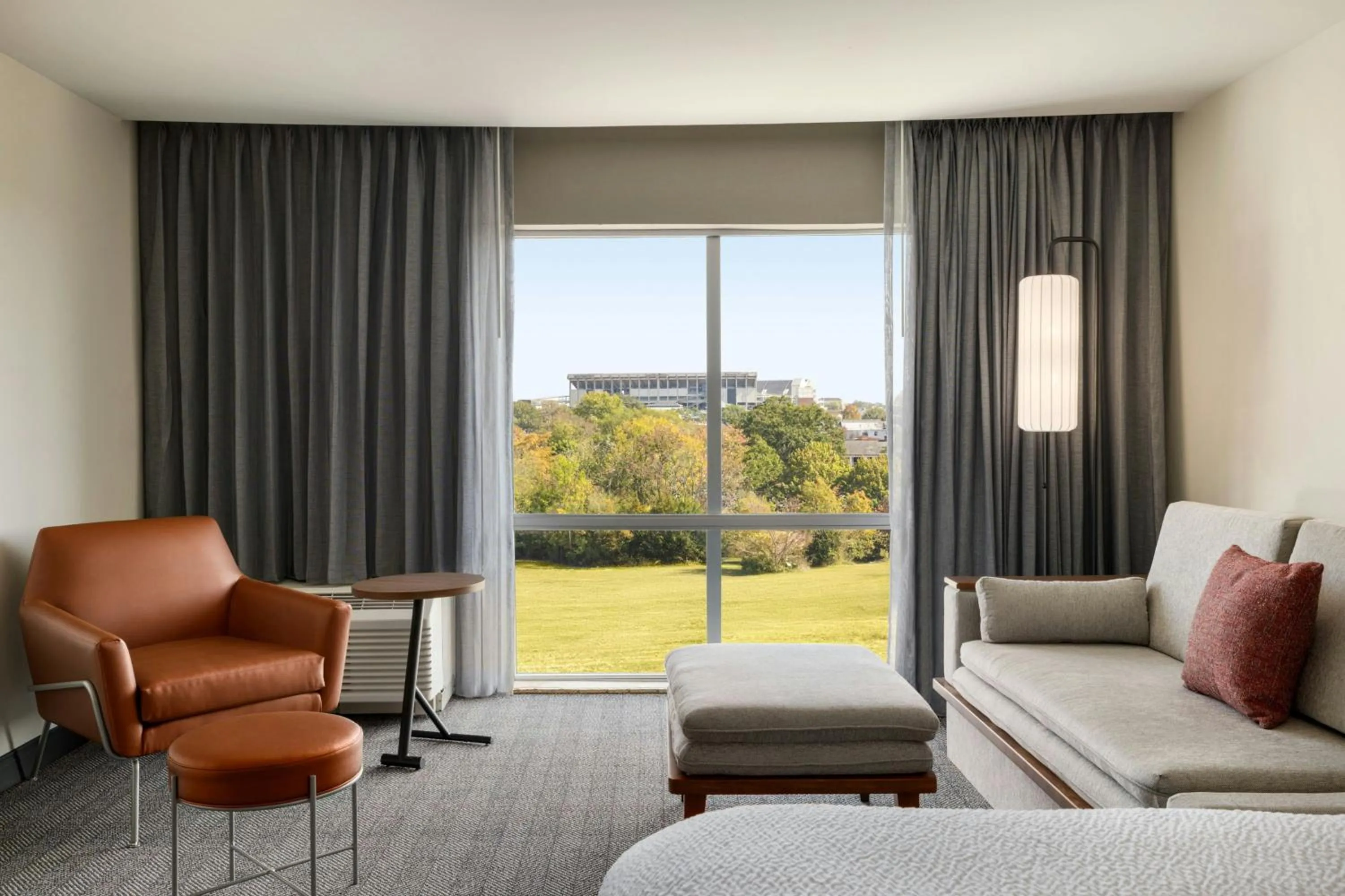 Living room in Courtyard by Marriott Starkville MSU at The Mill Conference Center