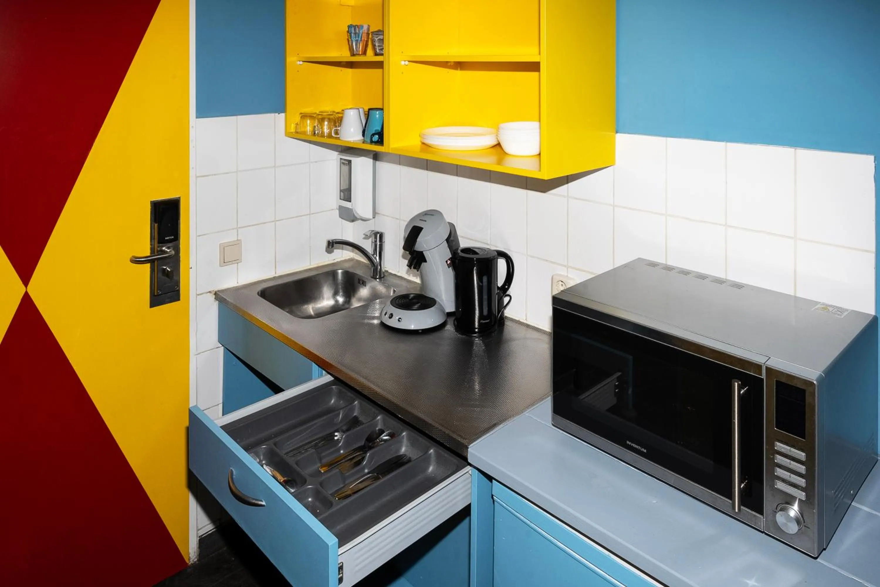 Kitchen or kitchenette in Amsterdam Teleport Hotel