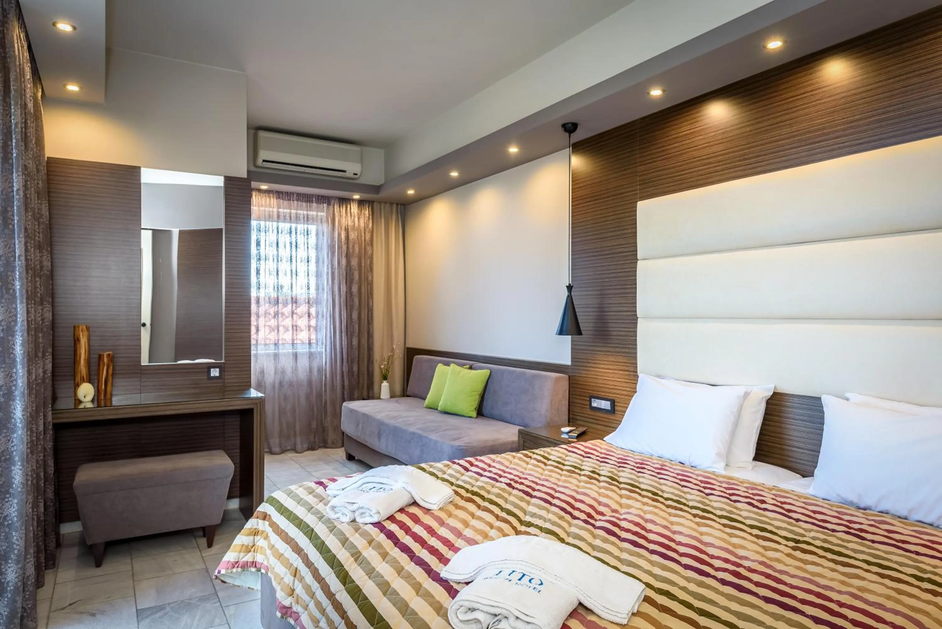 Bed in Lito Beach Hotel