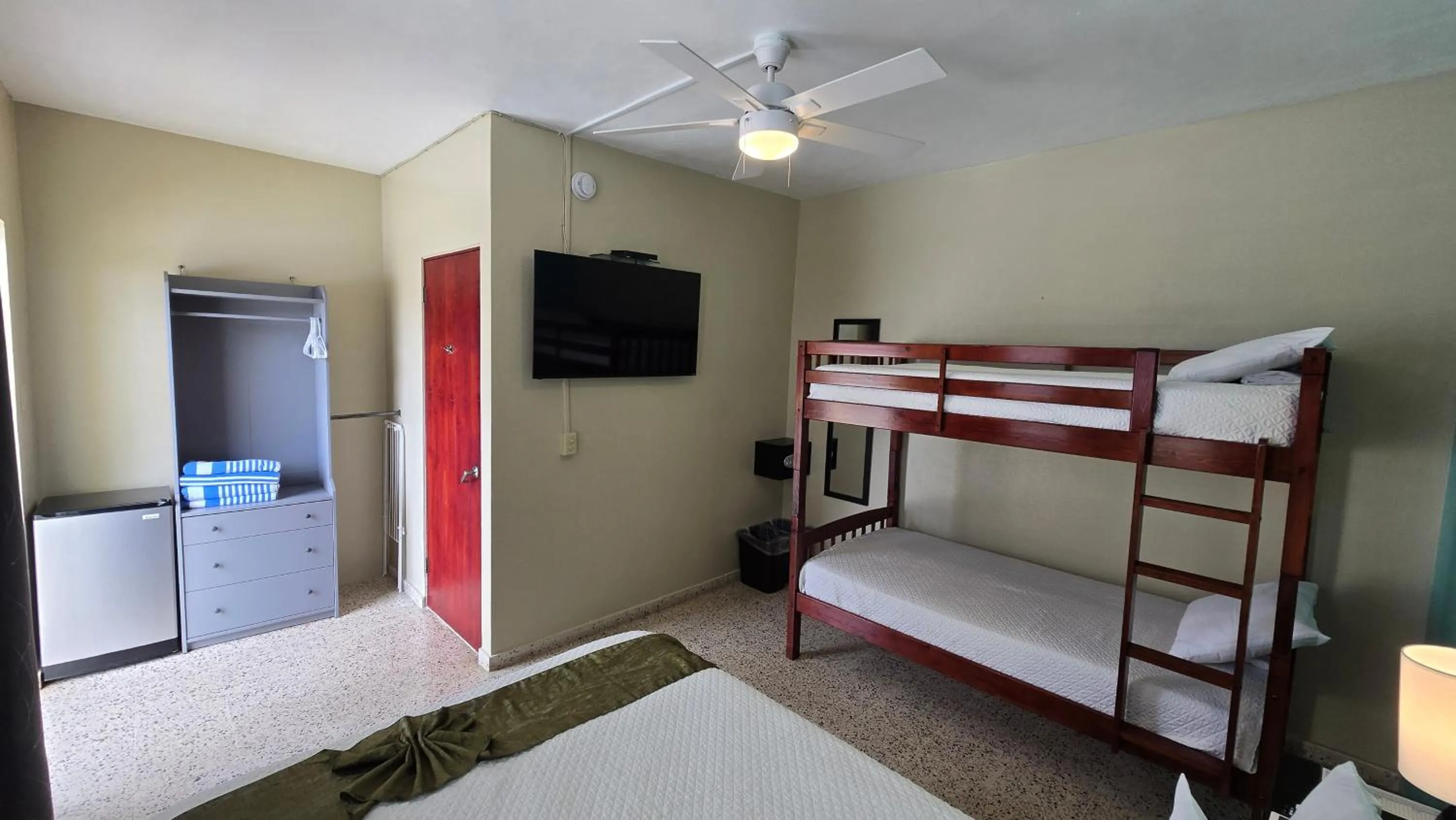 Bed in I Love Combate Rooms & Suites