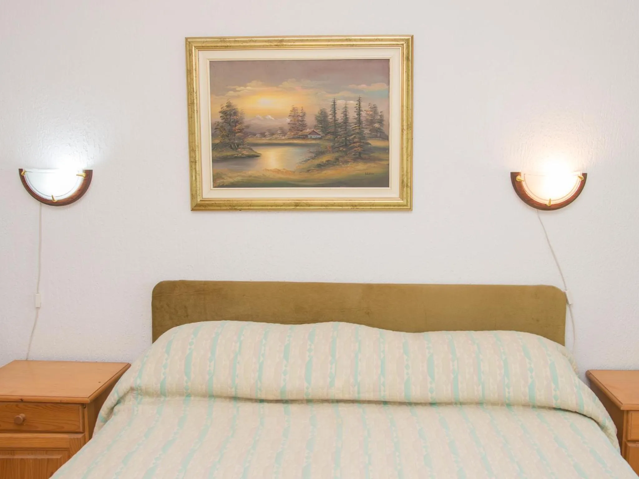 Bed in Apartments Dikan