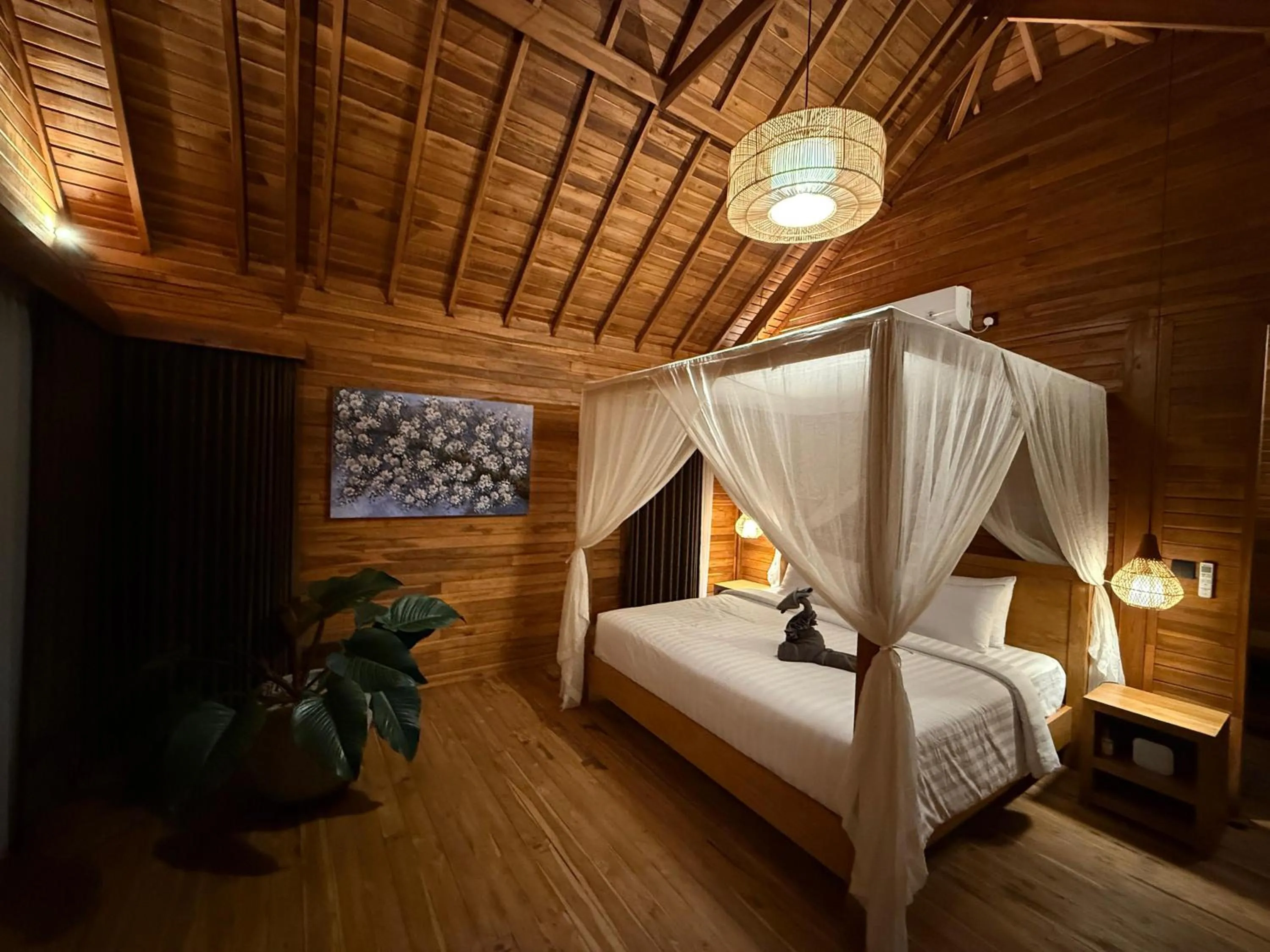 Bed in Taman Swarga Villa Resort & Spa Sidemen