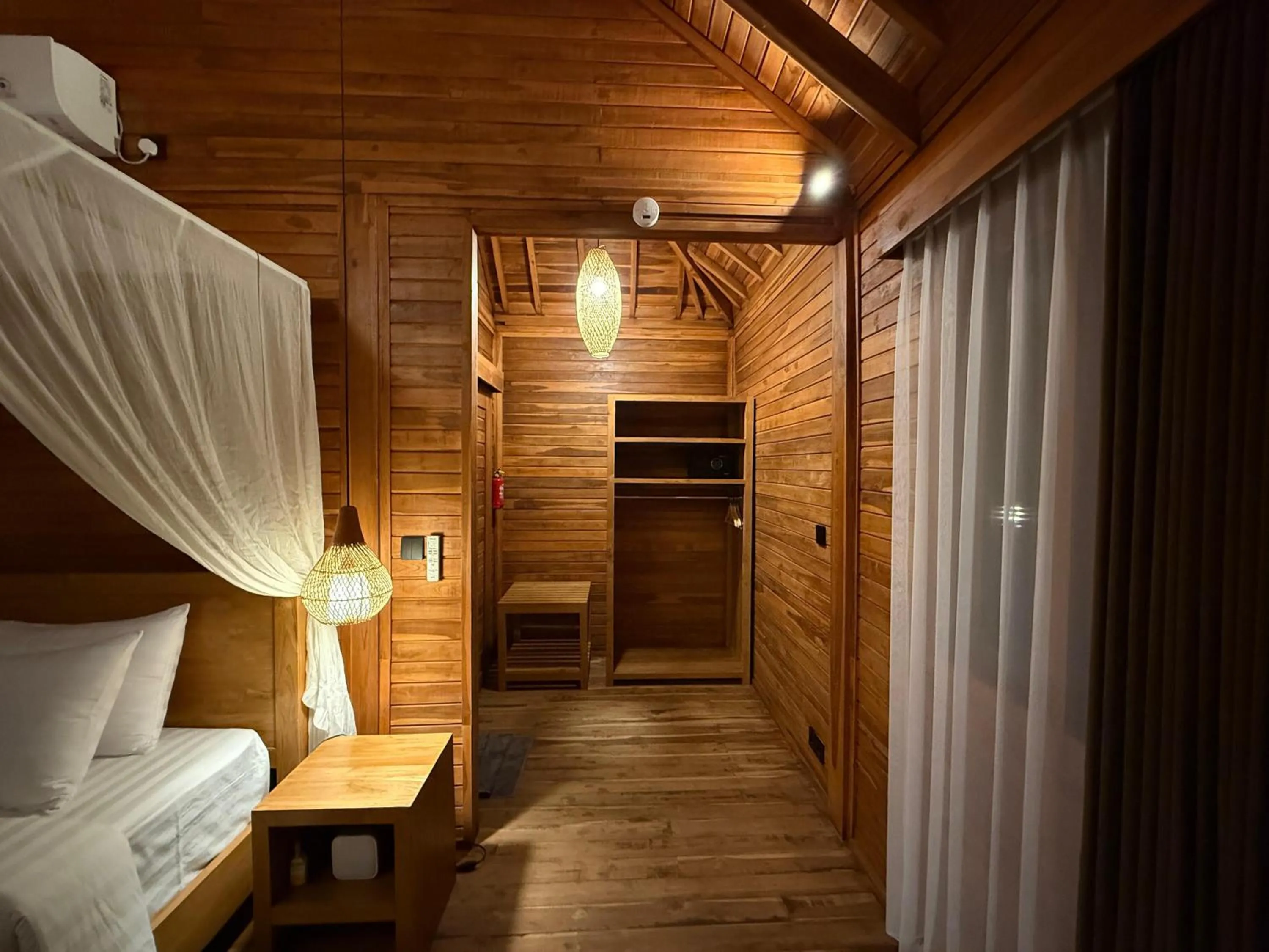 wardrobe, Bed in Taman Swarga Villa Resort & Spa Sidemen