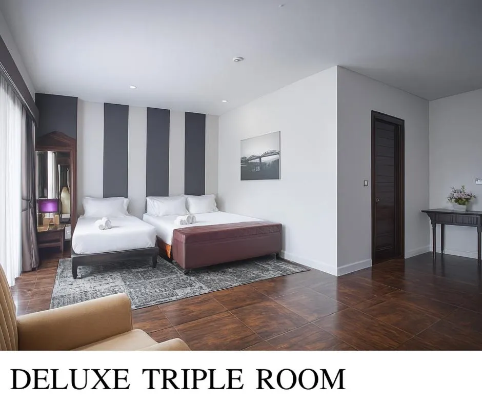 Bed in The Bridge Residence Hotel