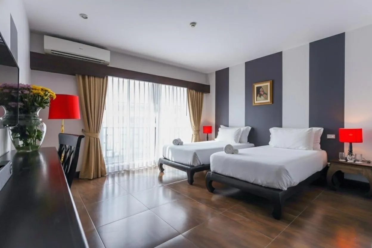 Bed in The Bridge Residence Hotel