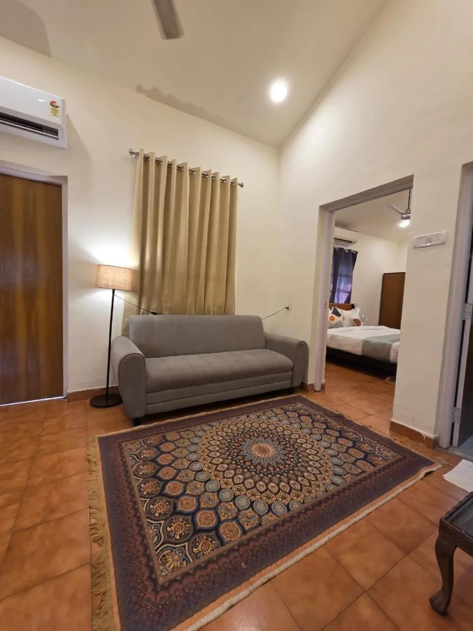Seating area, Bed in Perfectstayz Premium Goa Continental Baga