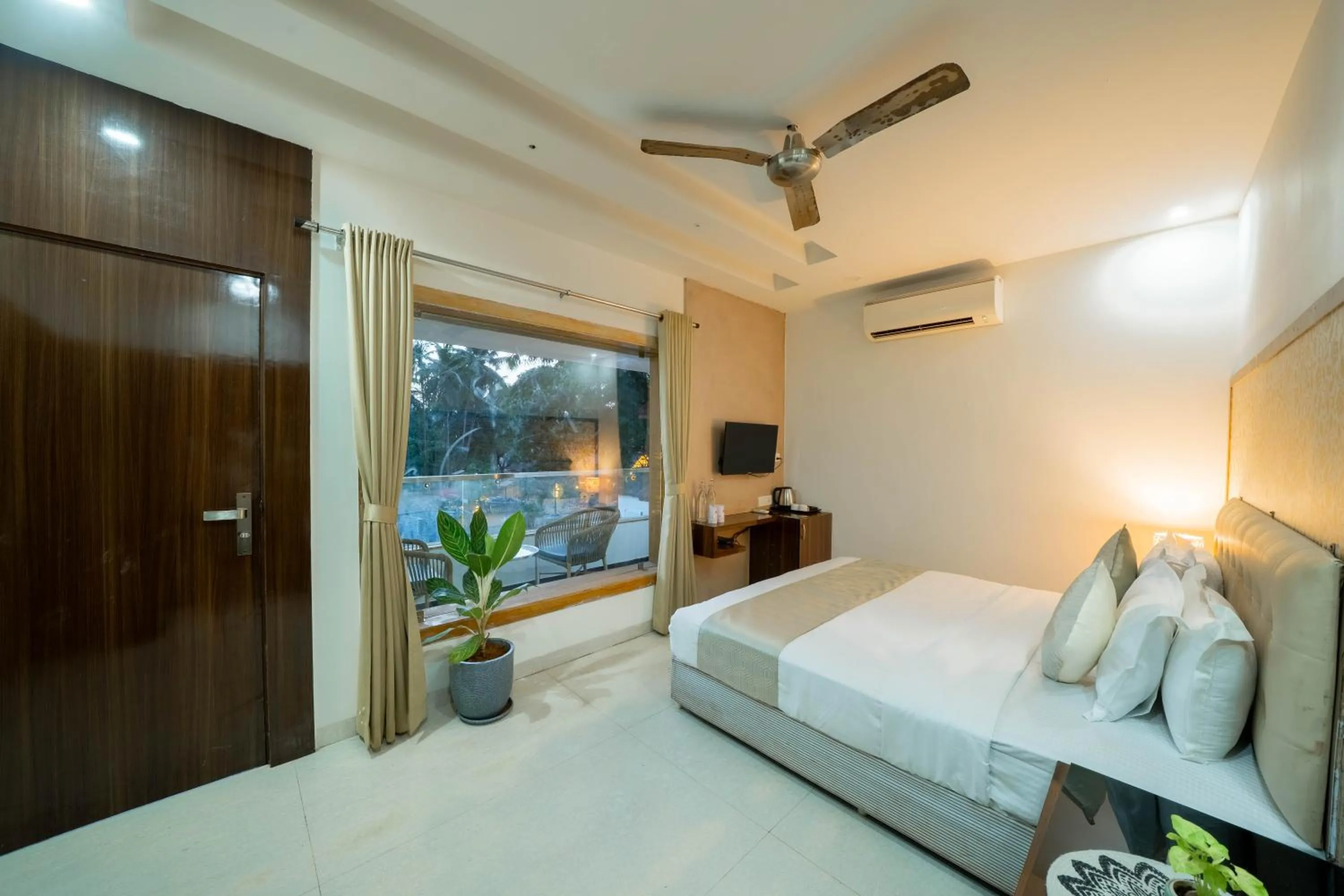 Bed in Perfectstayz Premium Goa Continental Baga