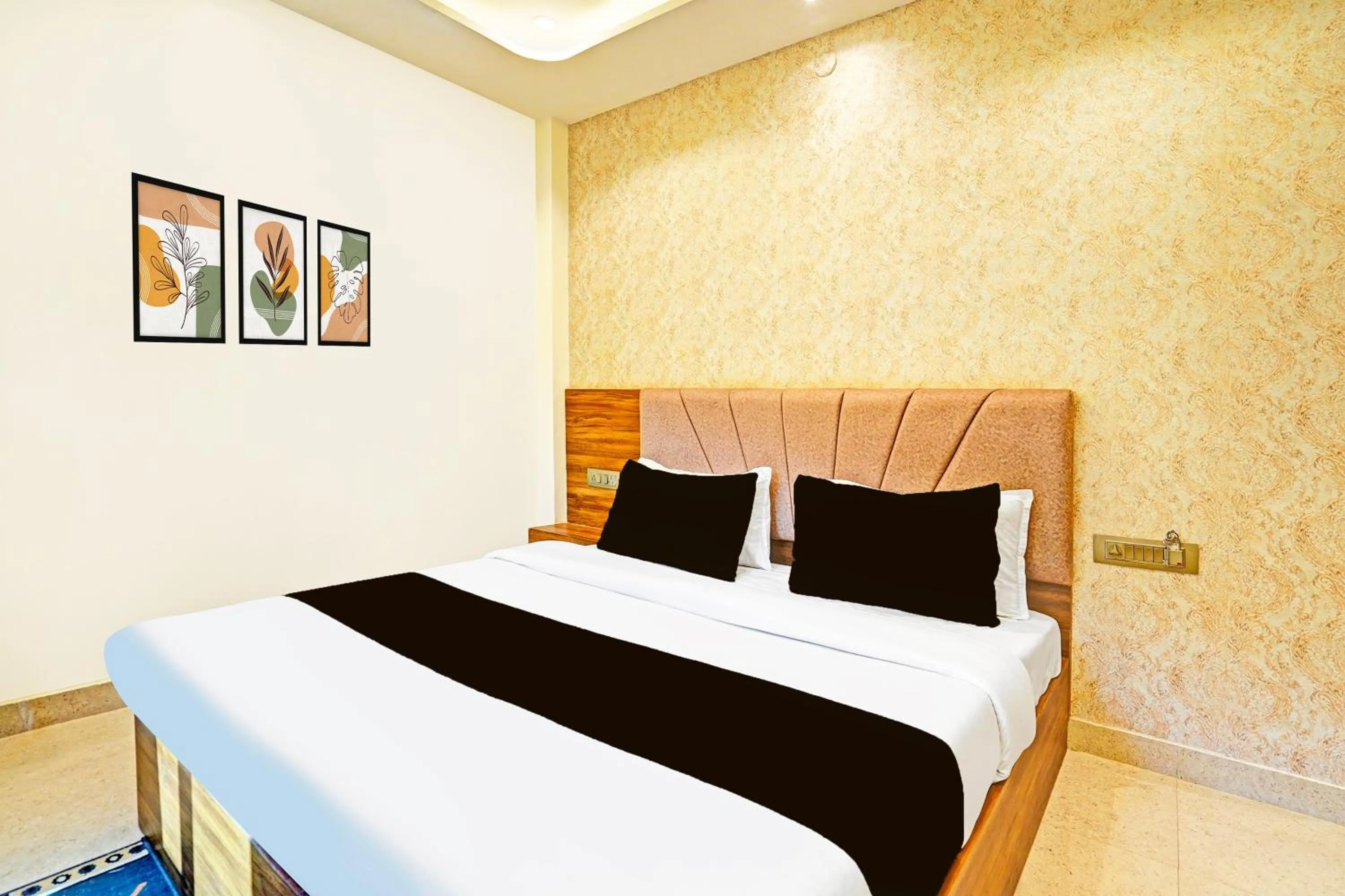 Bedroom in Hotel O MB Grand