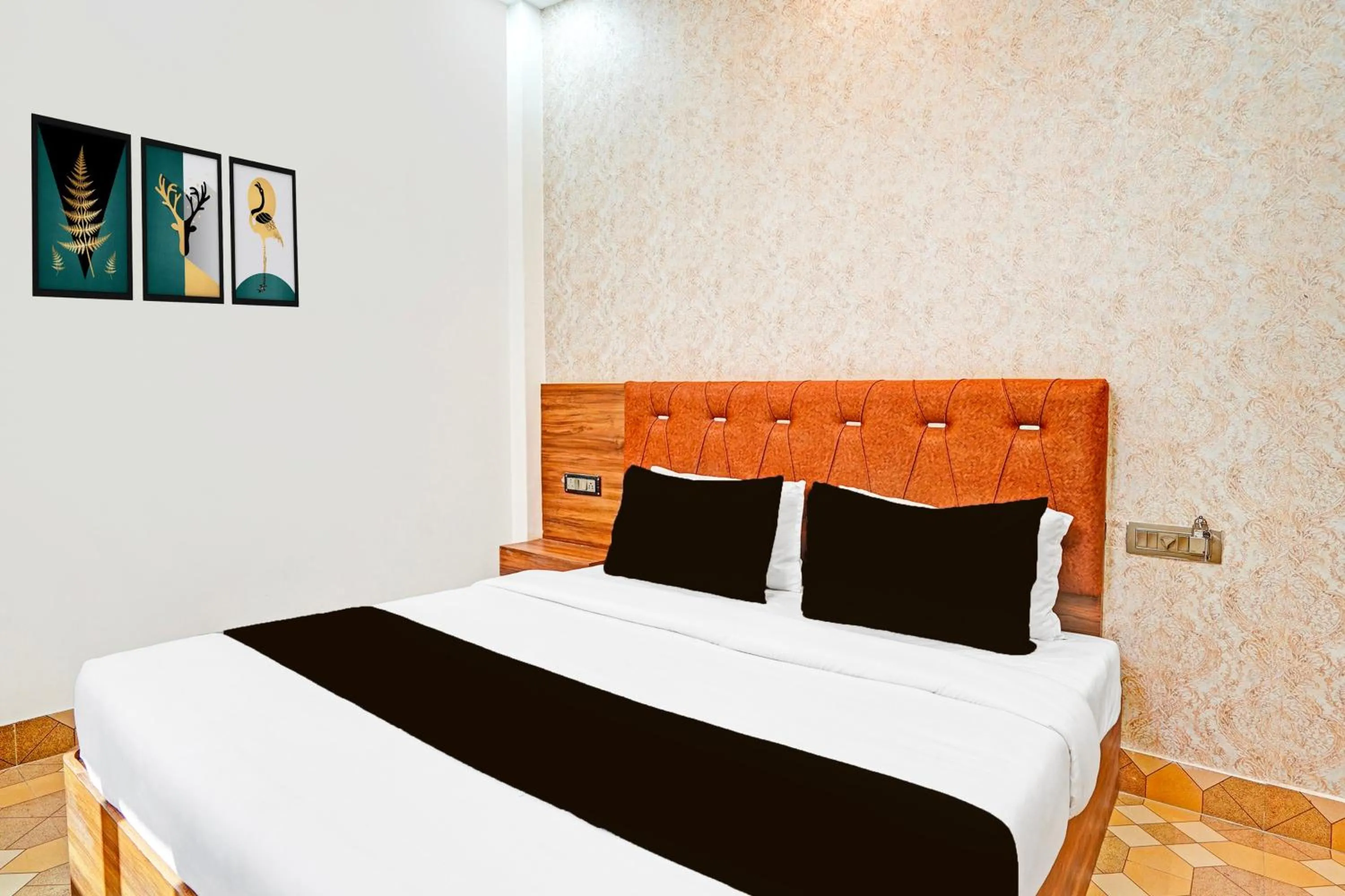 Bedroom in Hotel O MB Grand