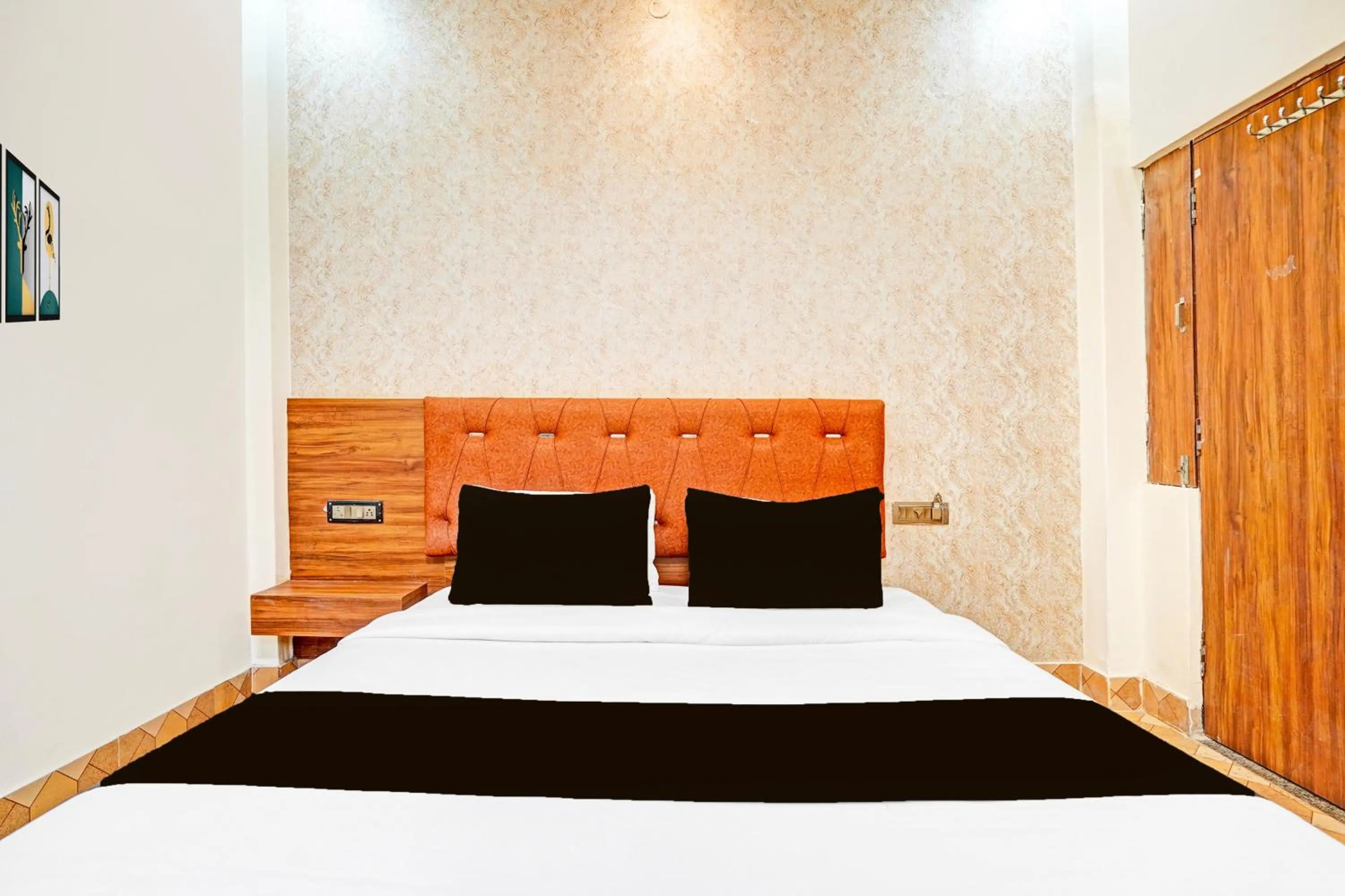 Bedroom in Hotel O MB Grand
