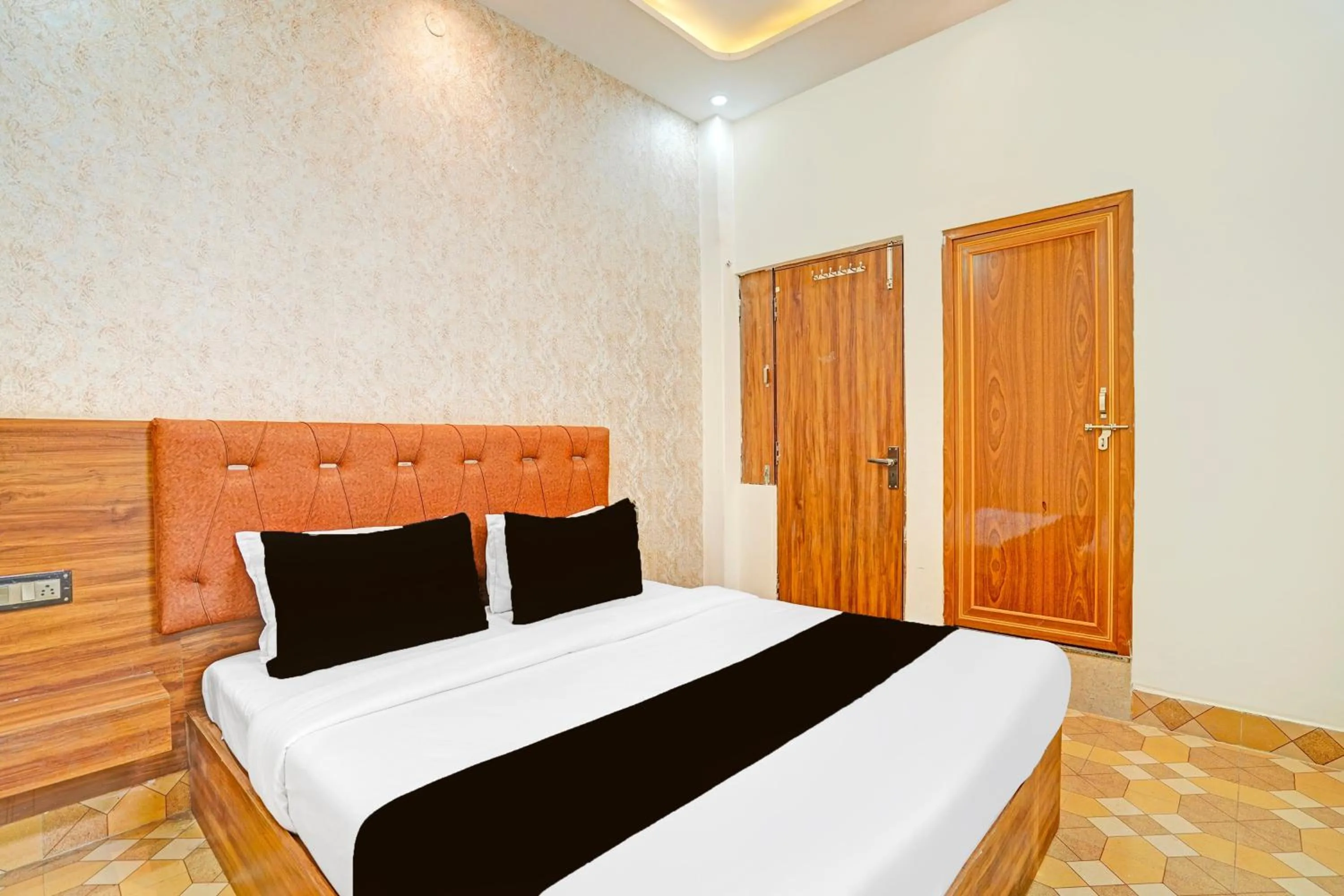 Bedroom in Hotel O MB Grand