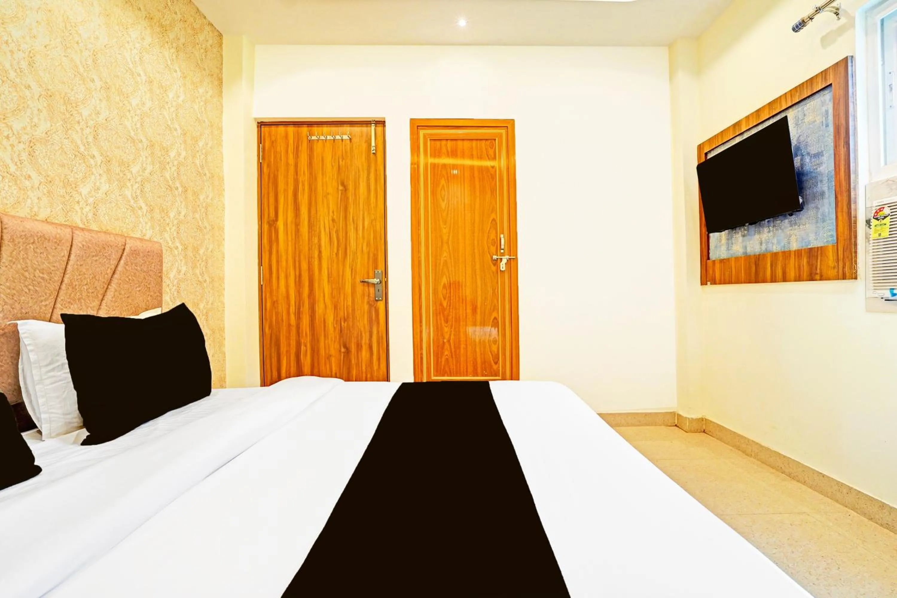 Bedroom in Hotel O MB Grand