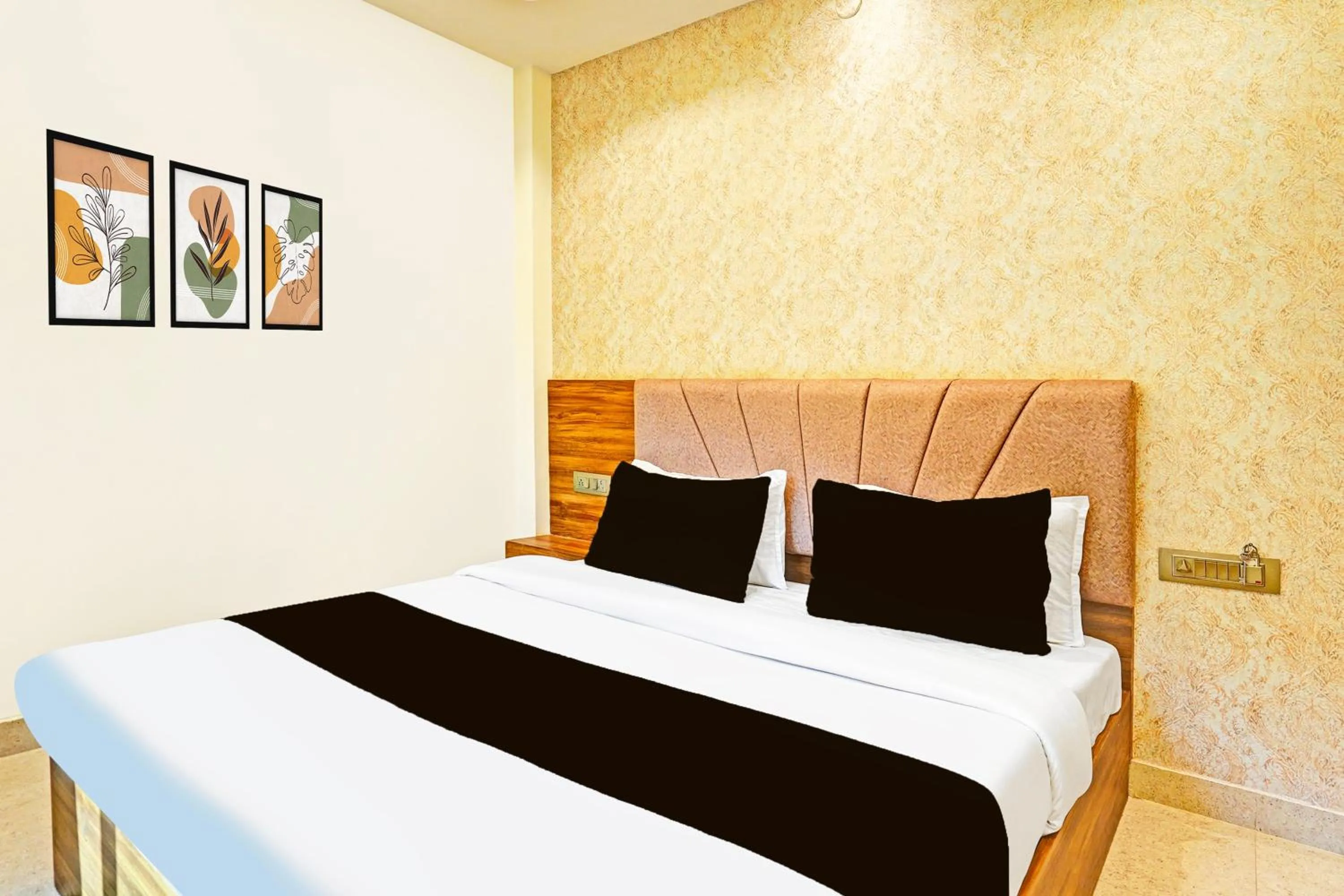 Bedroom in Hotel O MB Grand