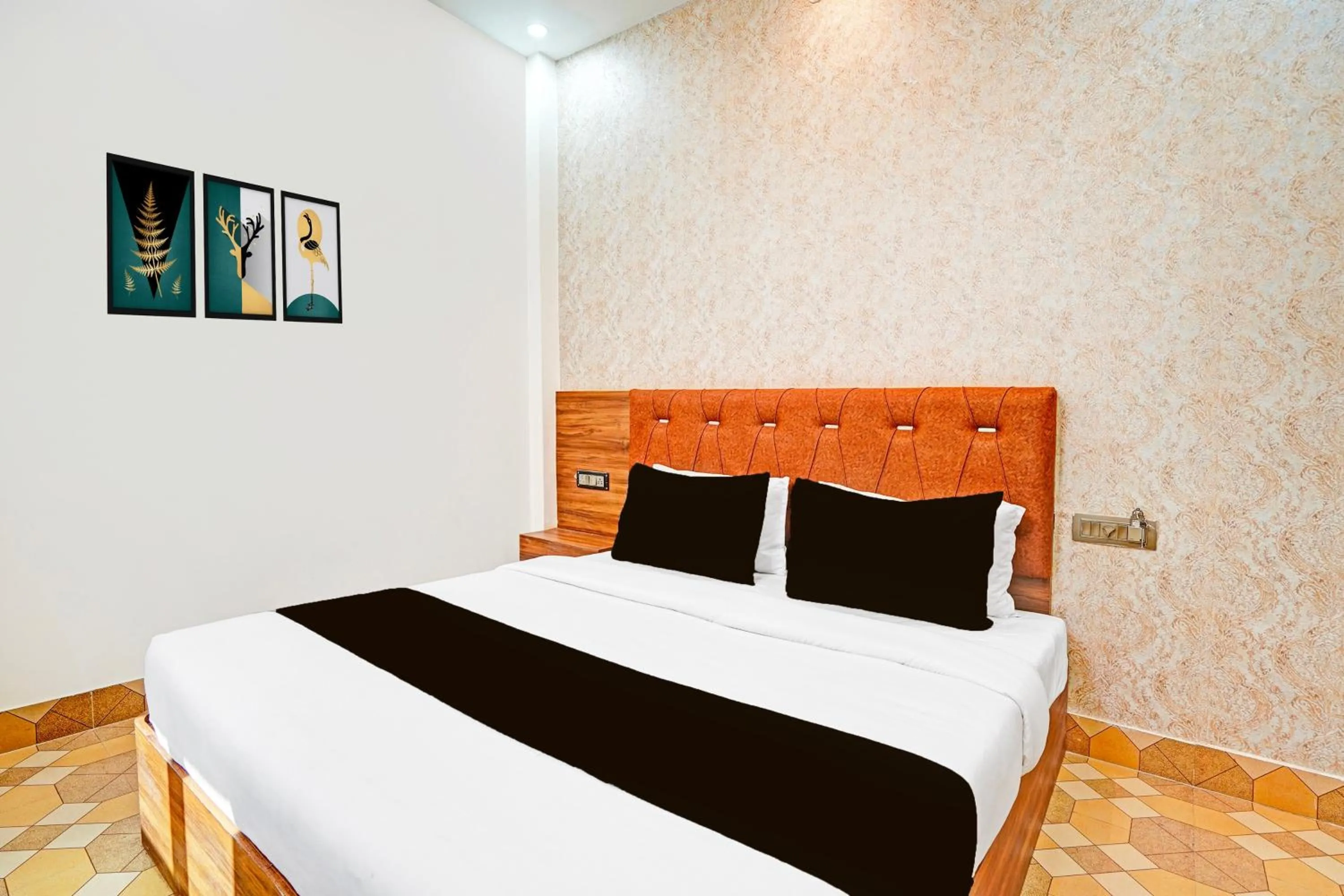 Bedroom in Hotel O MB Grand