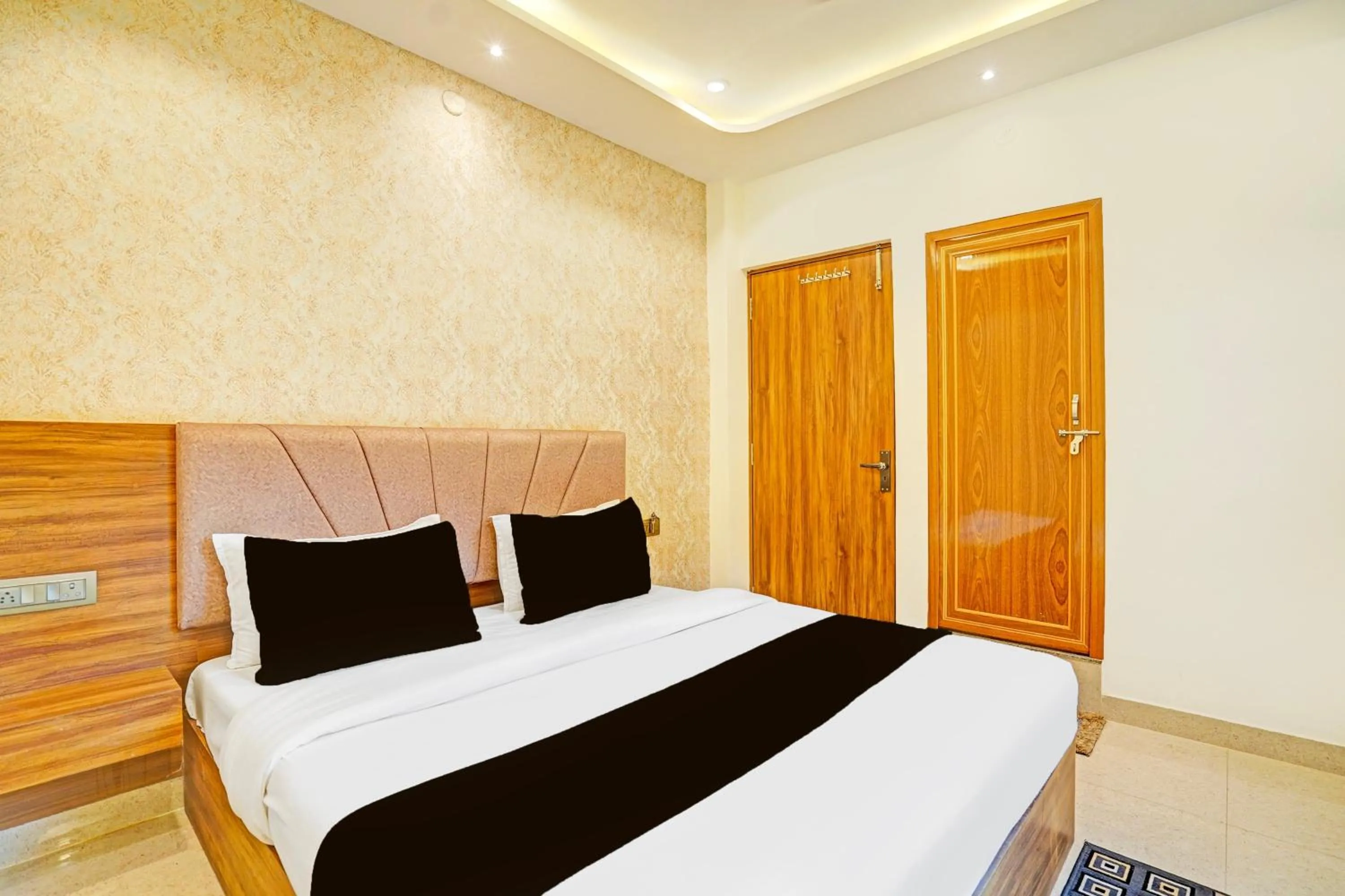 Bedroom in Hotel O MB Grand