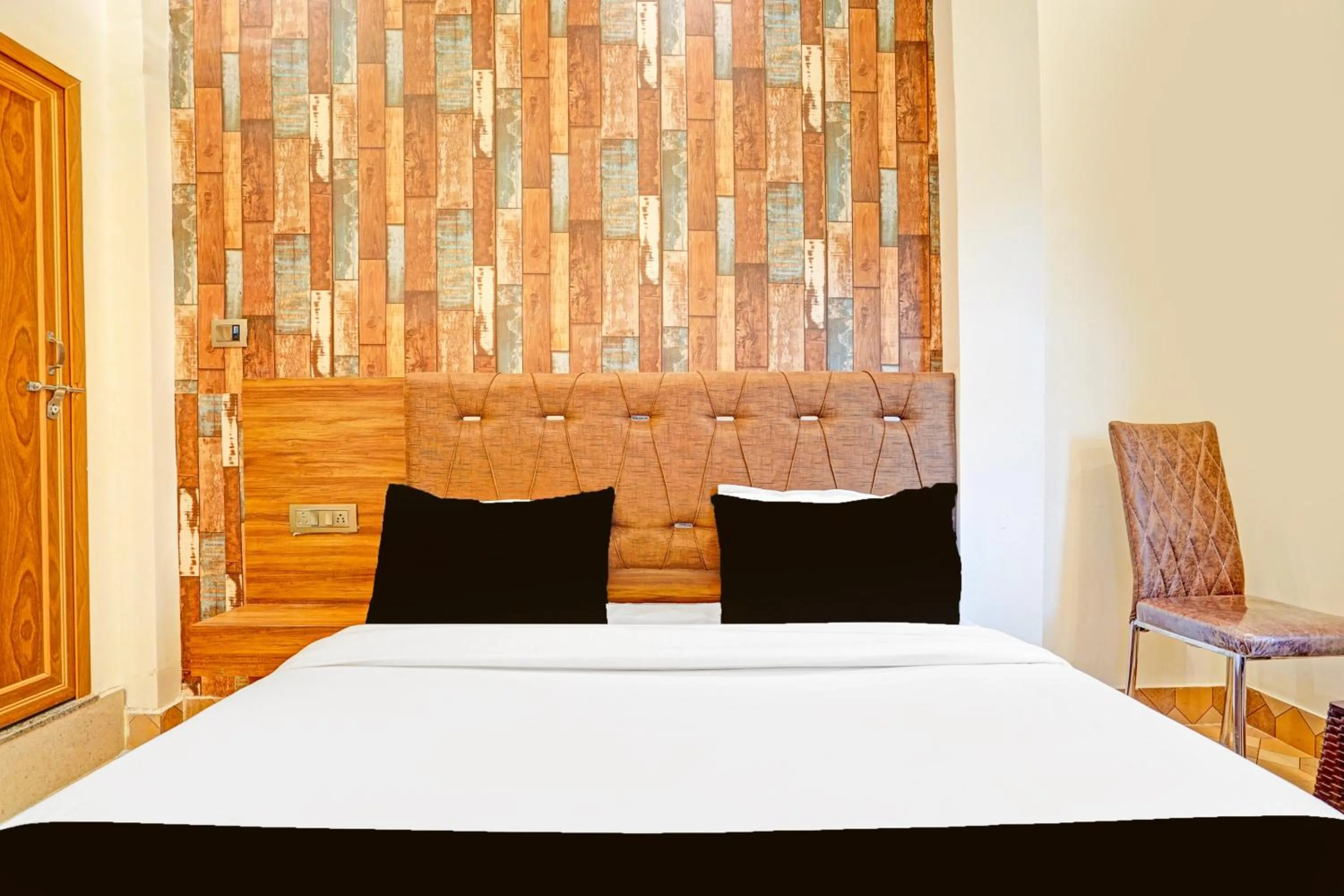 Bedroom in Hotel O MB Grand