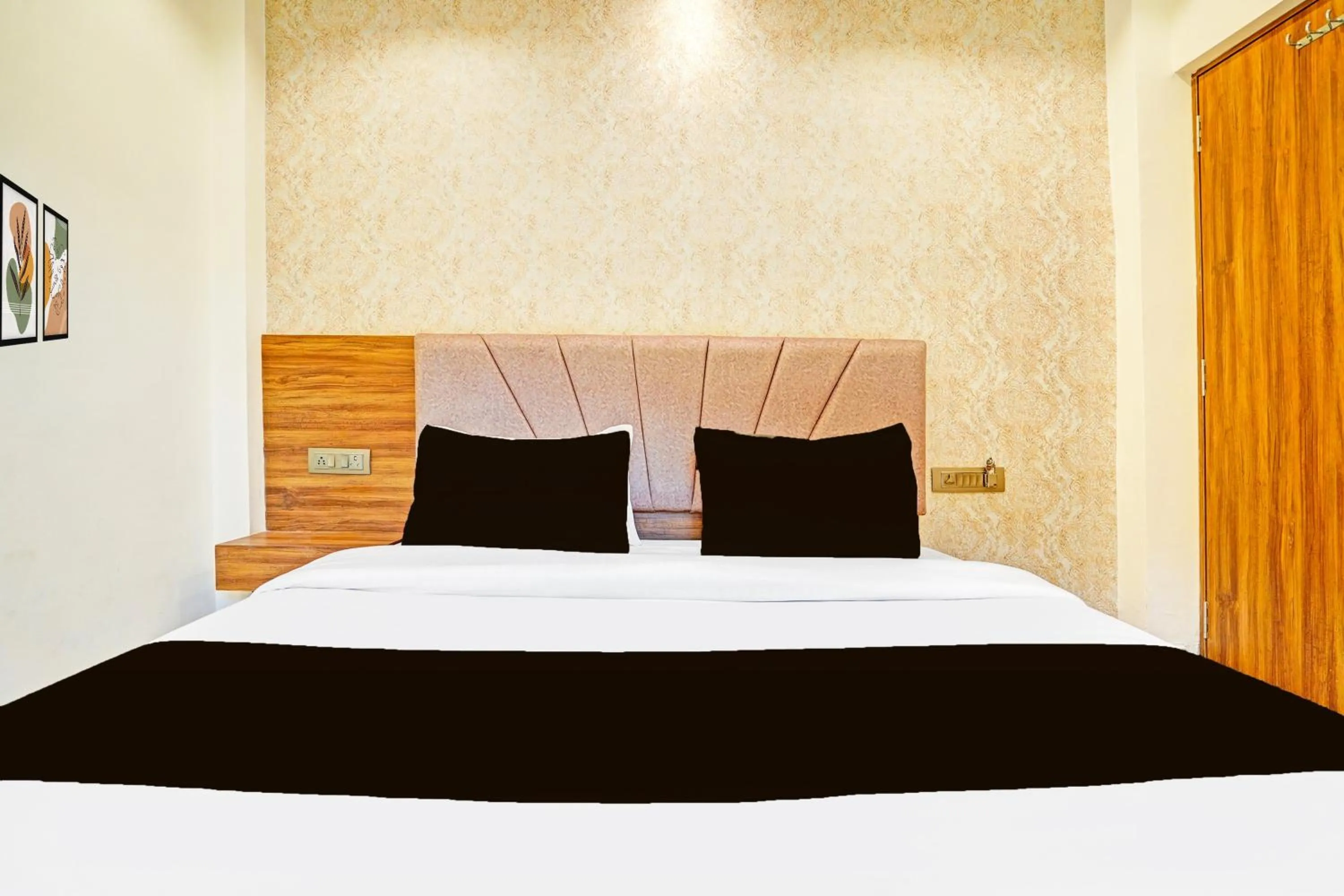 Bedroom in Hotel O MB Grand