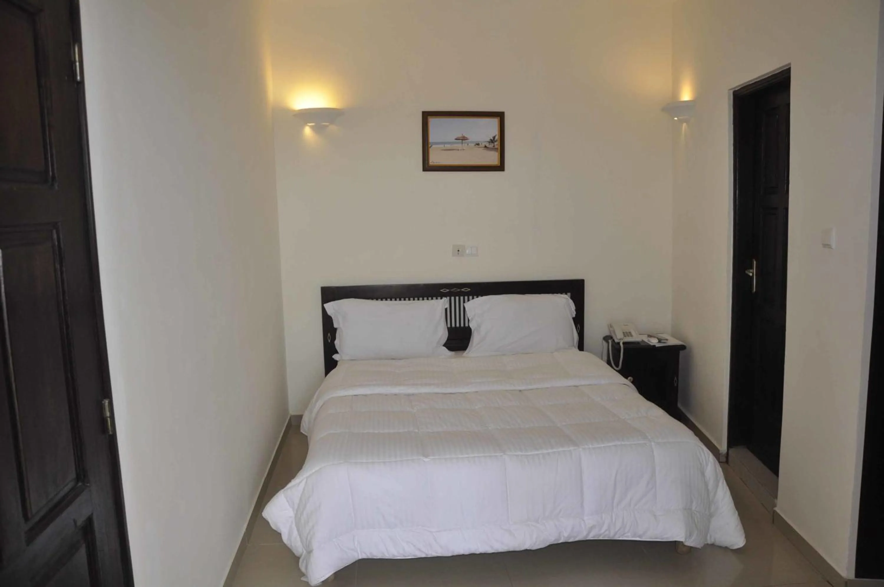 Photo of the whole room, Bed in Hôtel Résidence Madiba