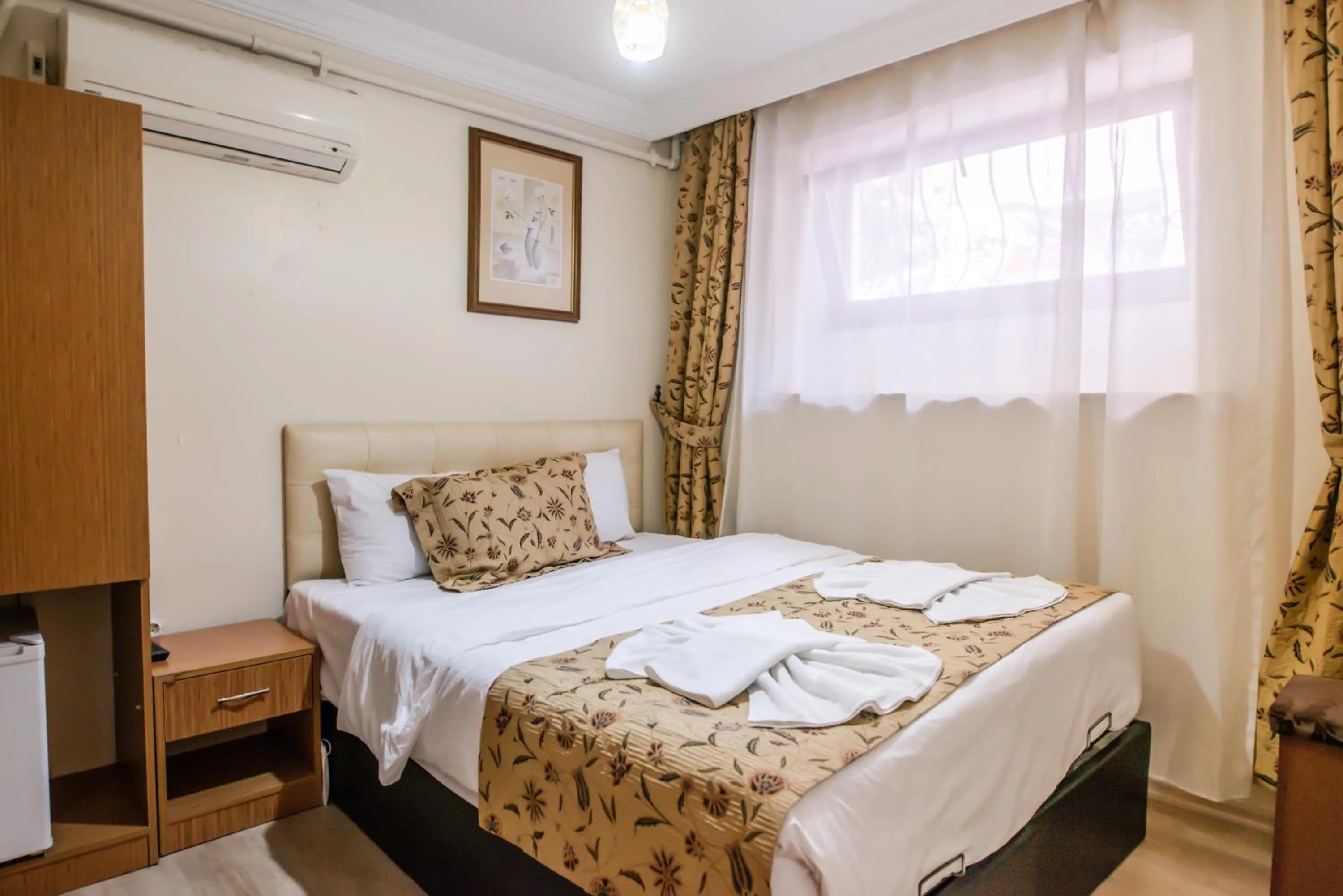 Bed in Camelot Apartment