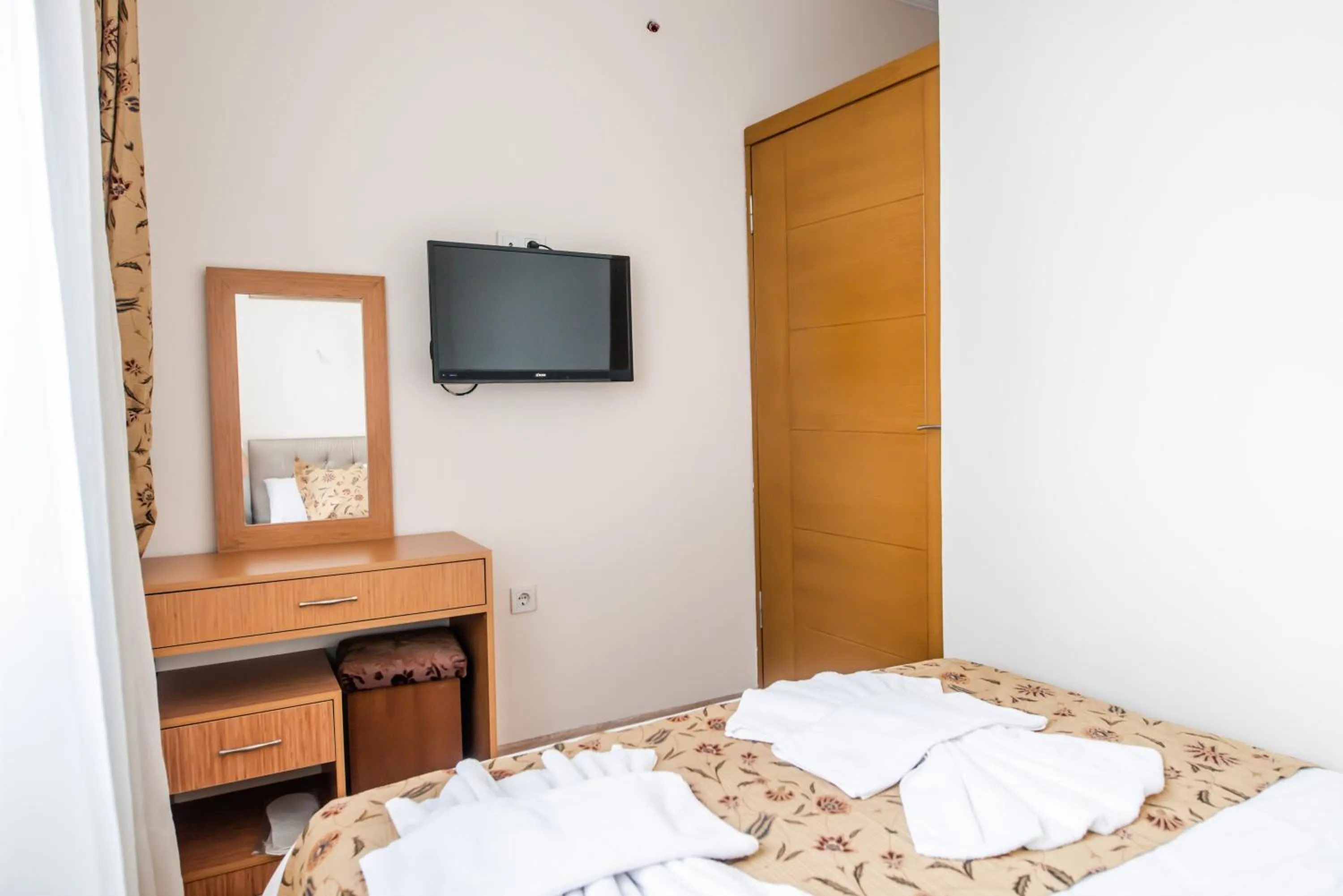 Bedroom in Camelot Apartment