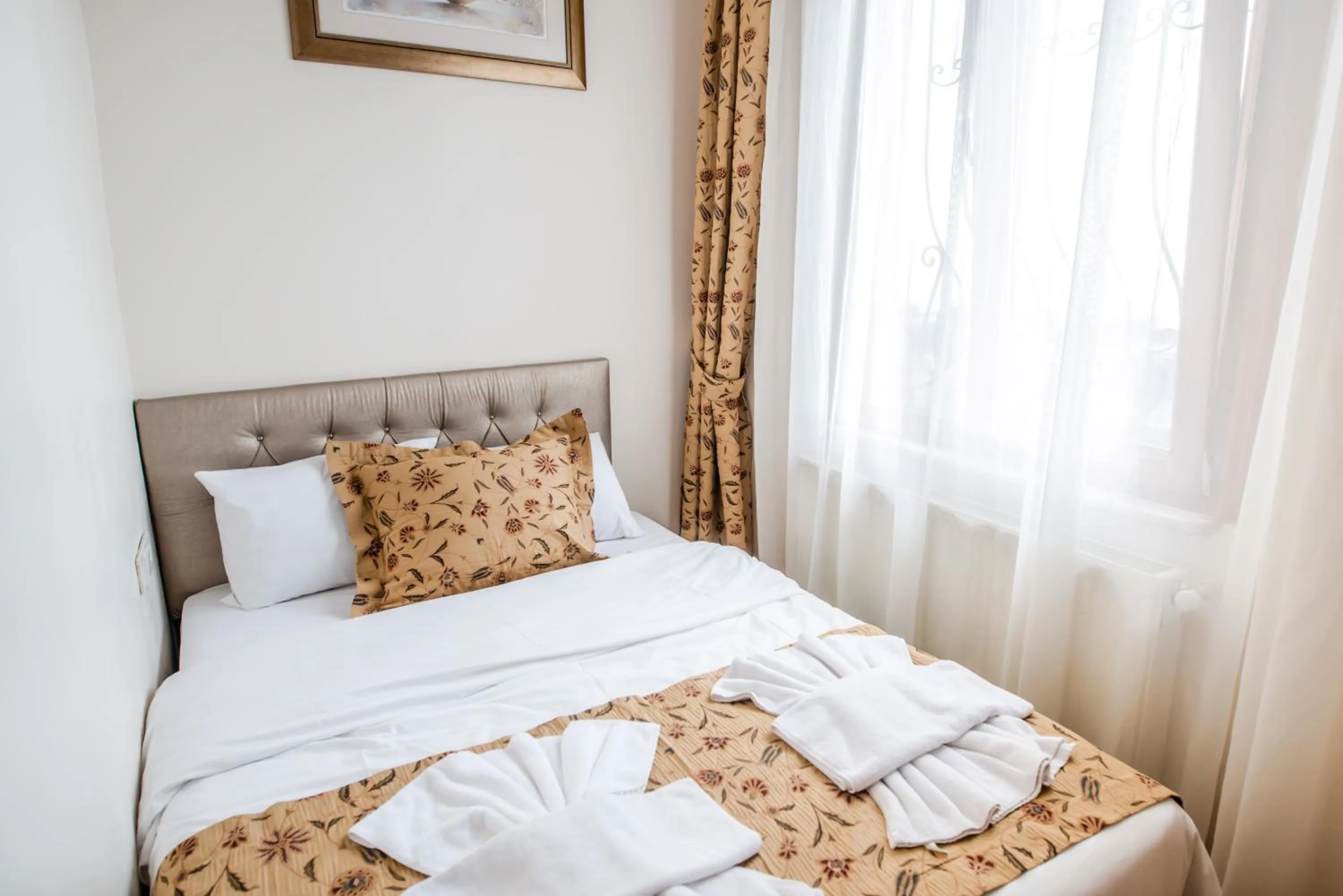 Bedroom in Camelot Apartment