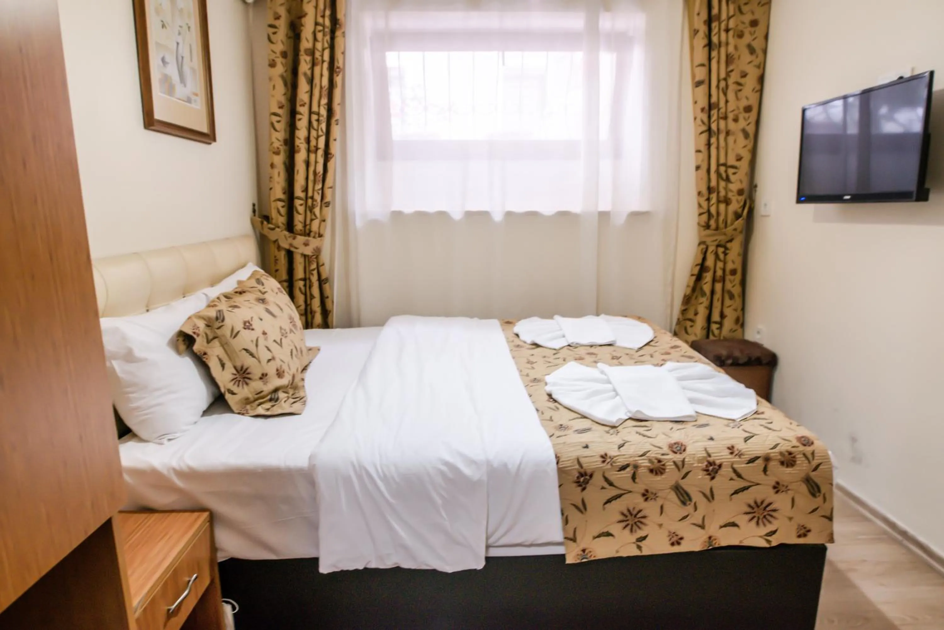 Bed in Camelot Apartment