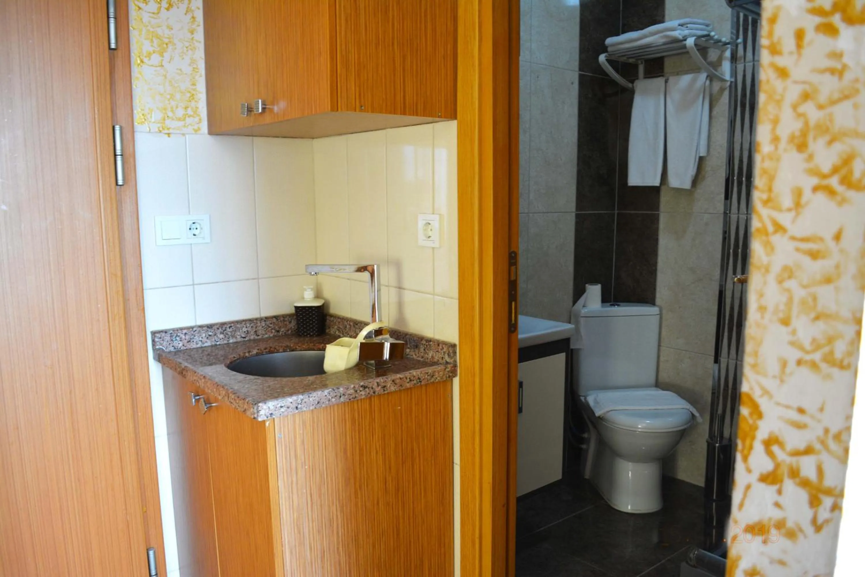 Kitchen or kitchenette in Camelot Apartment