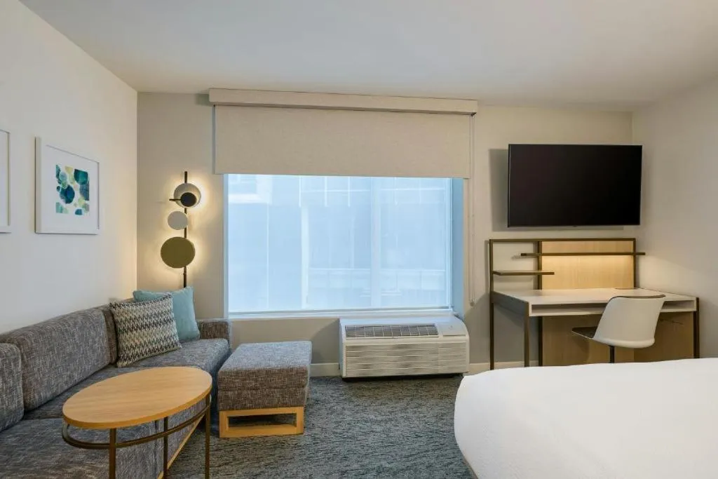 Communal lounge/ TV room, Bed in TownePlace Suites by Marriott Miramar Beach Destin