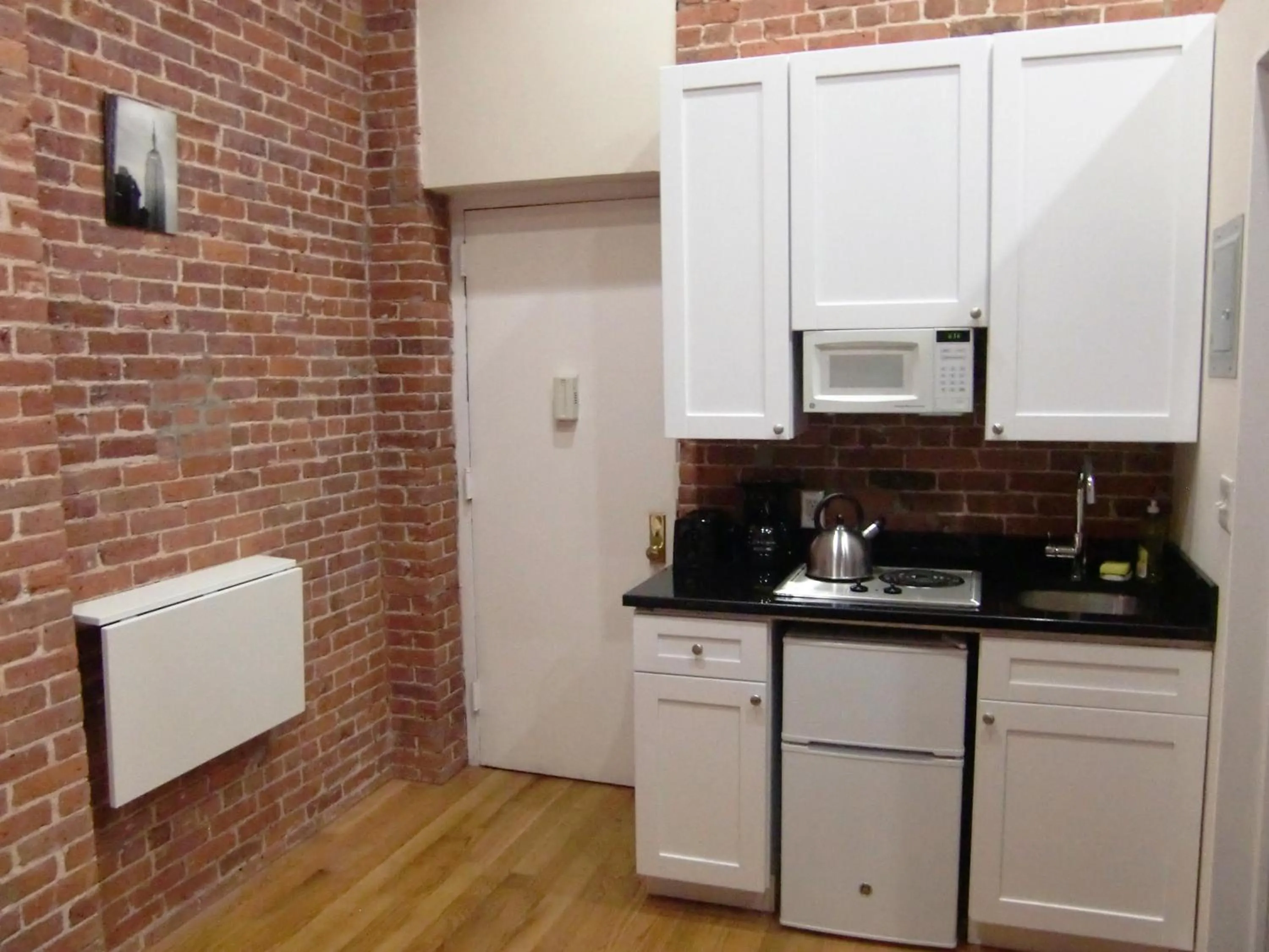 Kitchen or kitchenette in Studios Midtown Manhattan