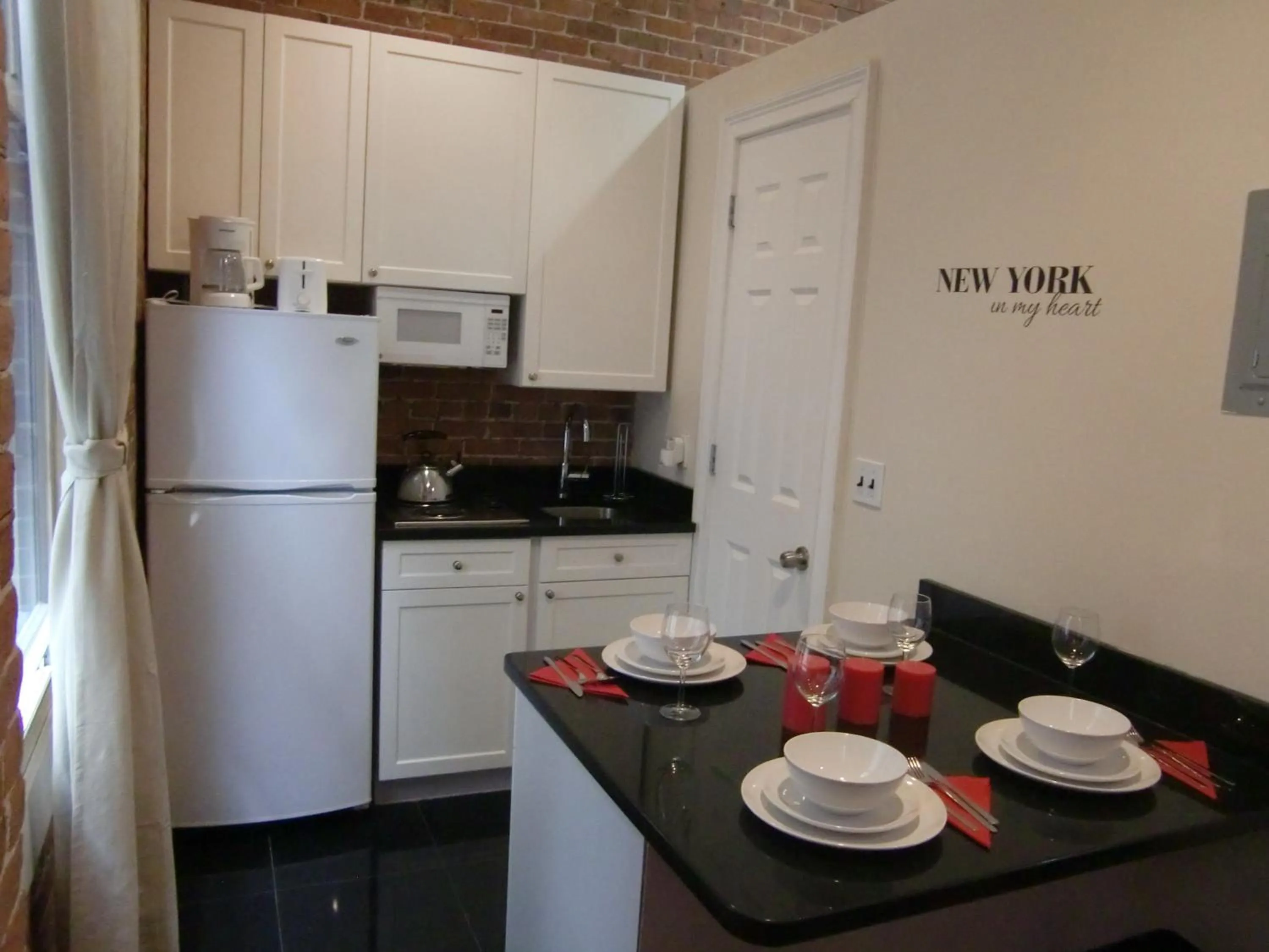 Kitchen or kitchenette in Studios Midtown Manhattan