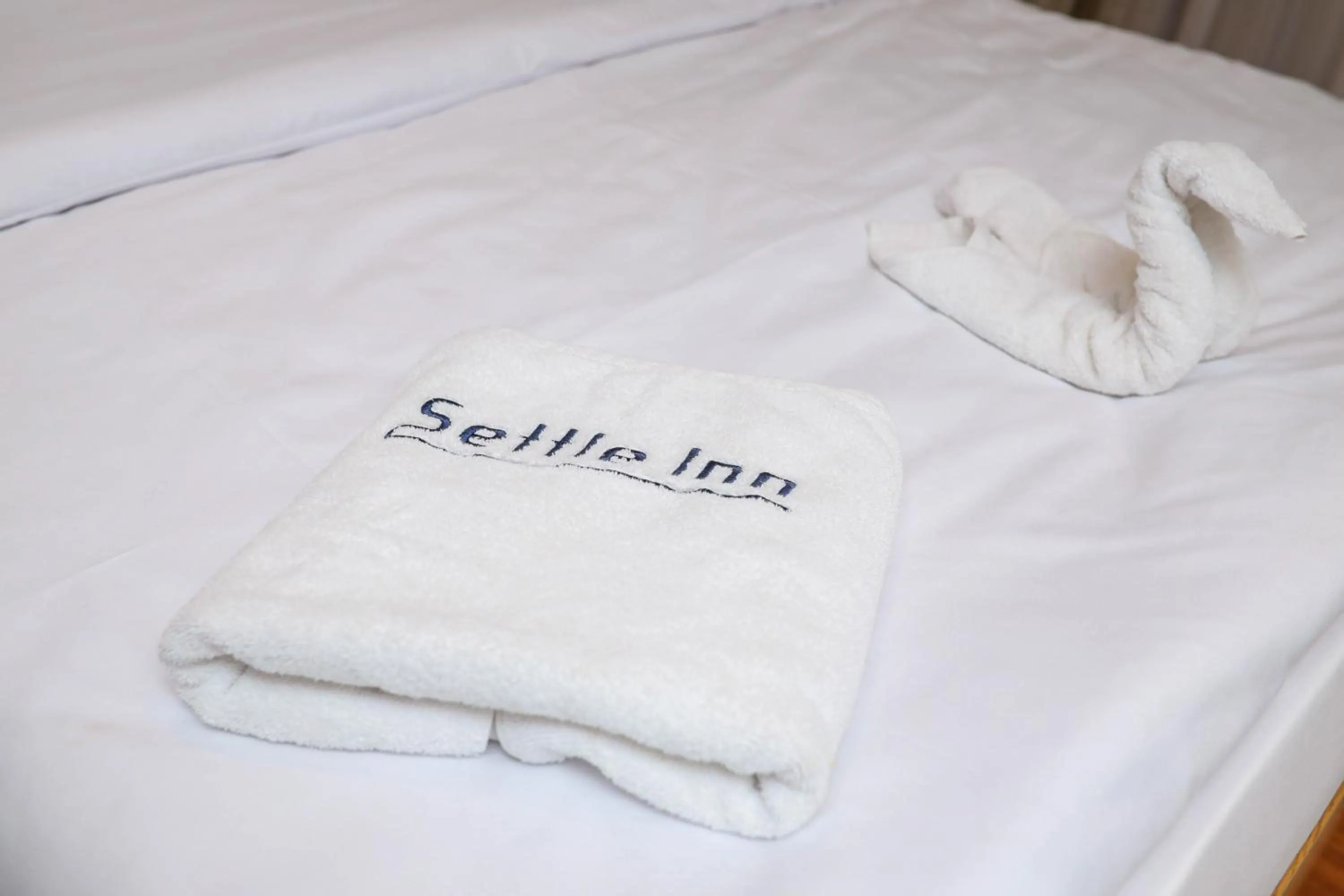 Photo of the whole room, Bed in Settle Inn Al Rehab City A