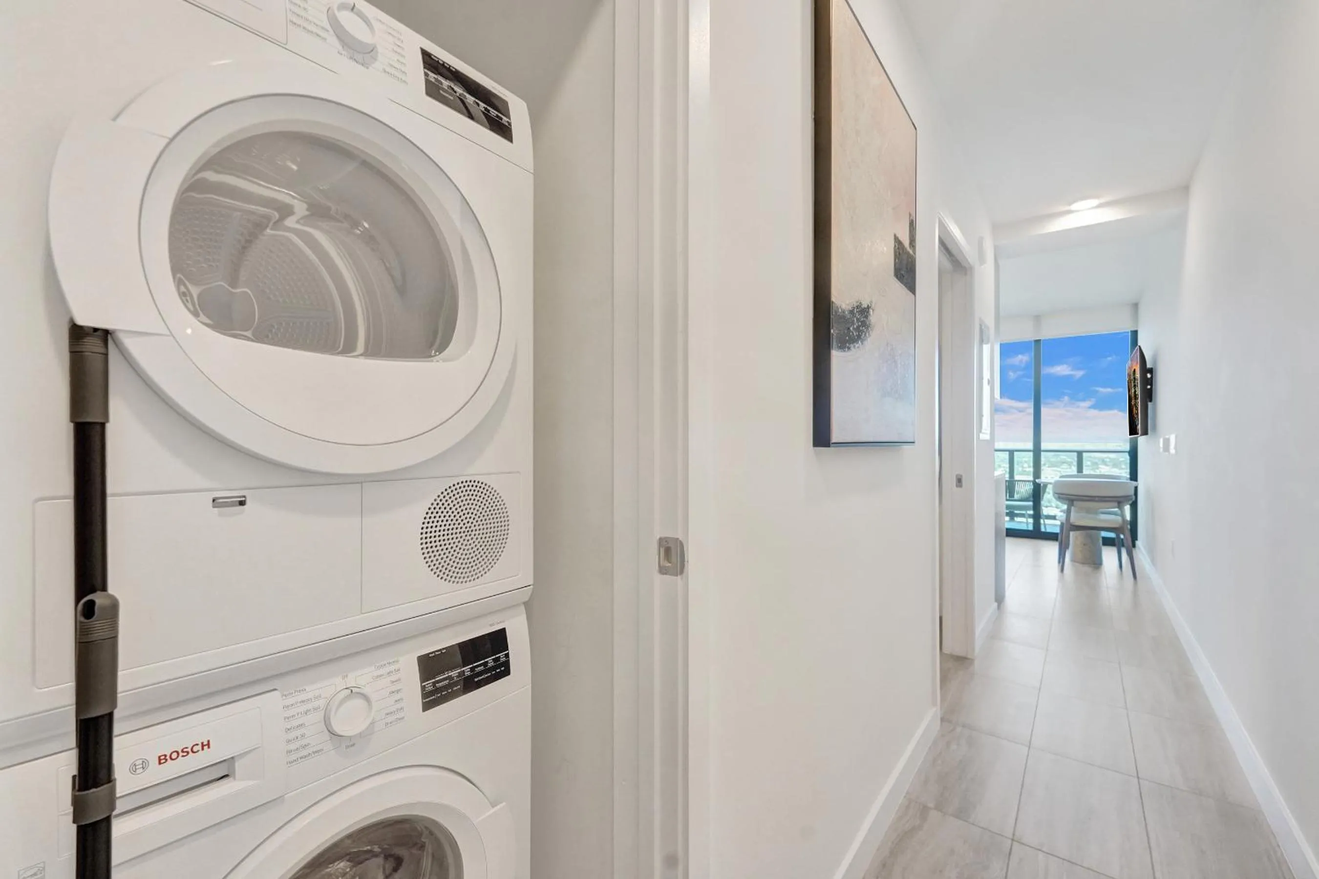 washing machine in 72 Park by Nomada Residences