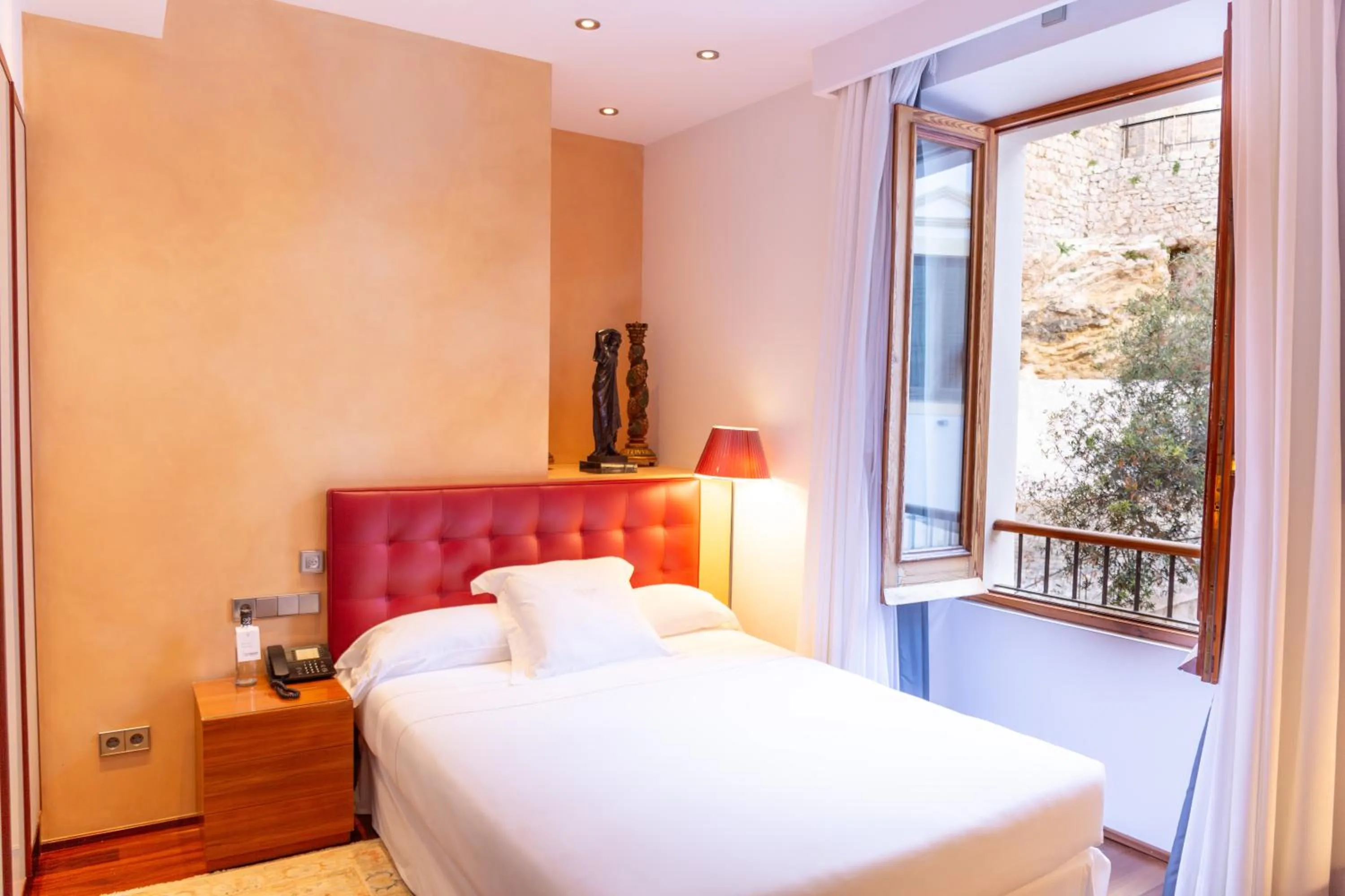 Bed in Mirador de Dalt Vila-Relais & Chateaux