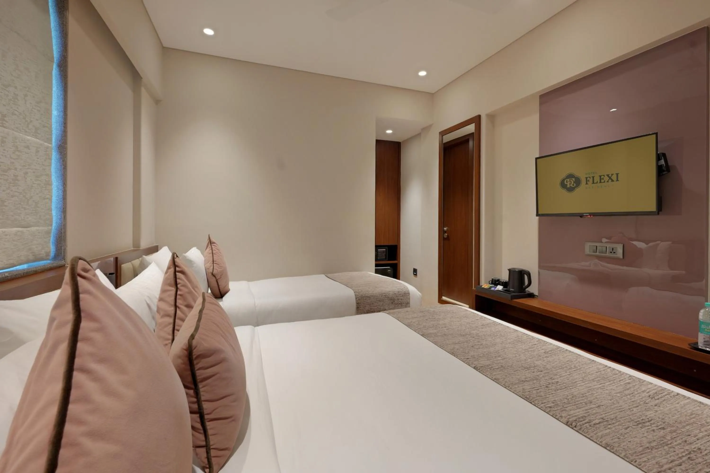 Photo of the whole room, Bed in Hotel Flexi Residency Mumbai International Airport