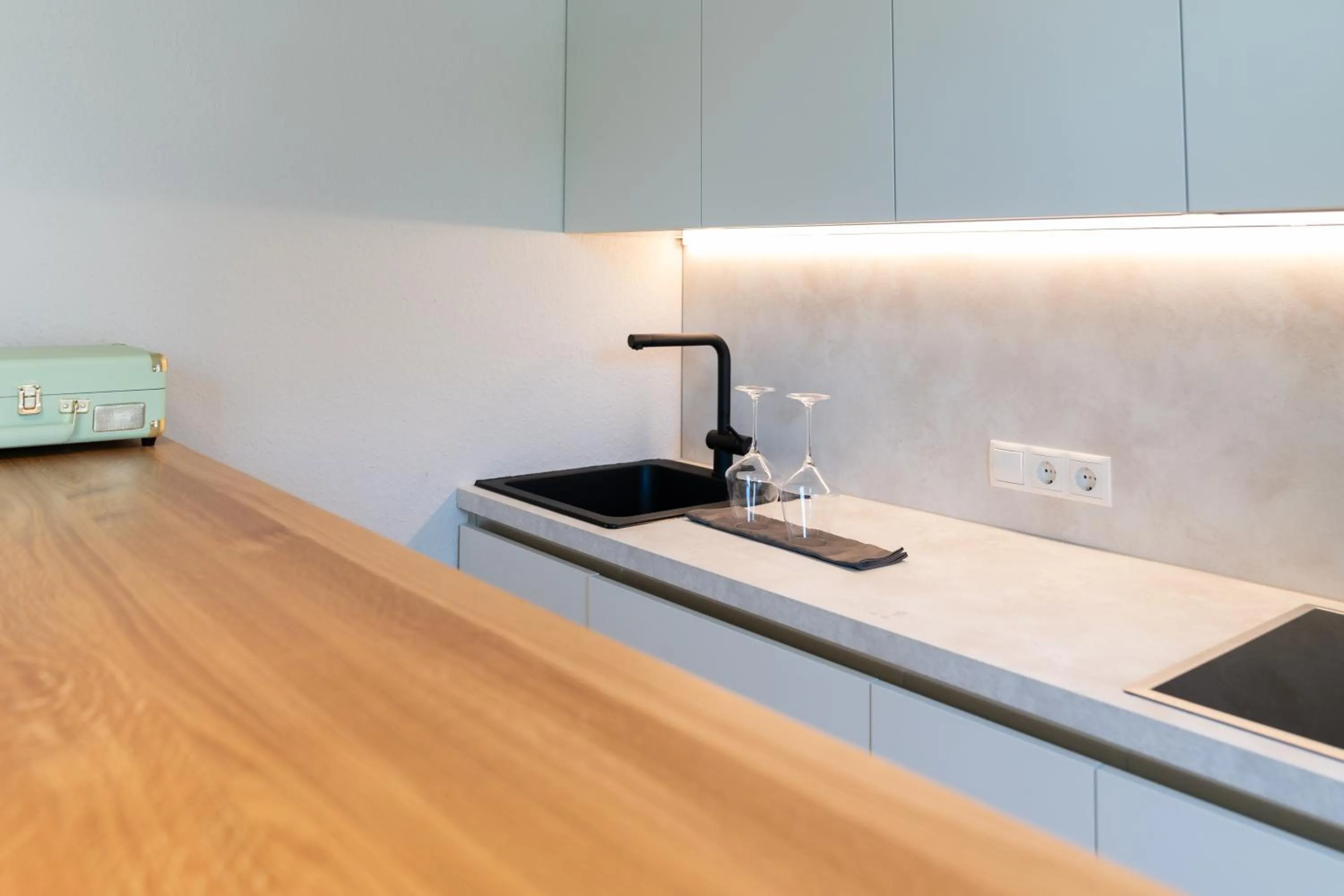 Kitchen or kitchenette in Velotique Hotel Angelika - Self-Check-in