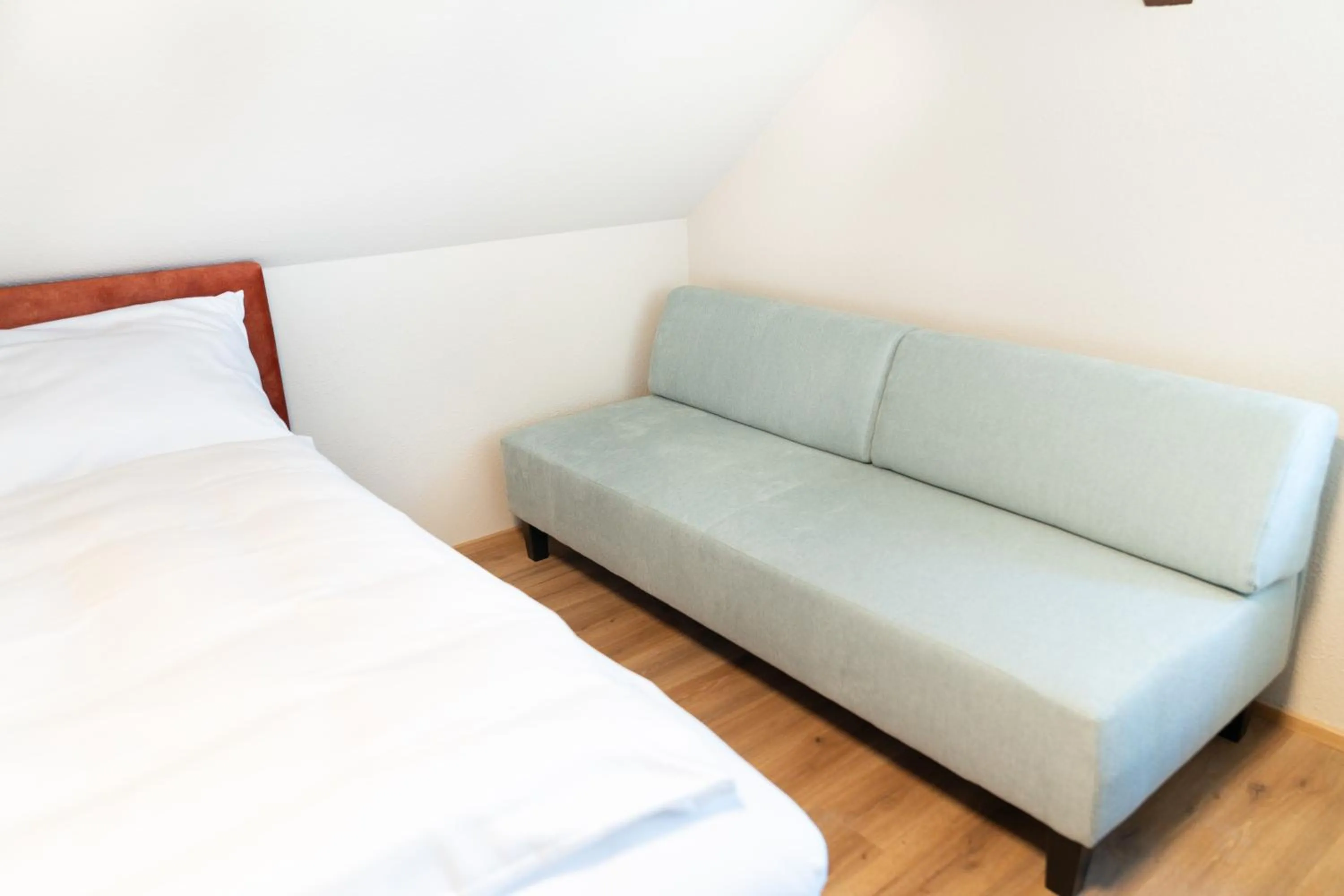 Bed in Velotique Hotel Angelika - Self-Check-in