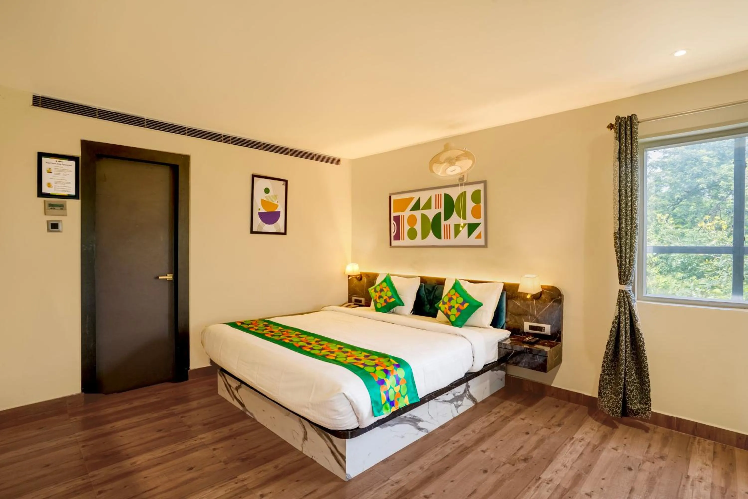 Bedroom, Bed in Treebo Golden Leaf