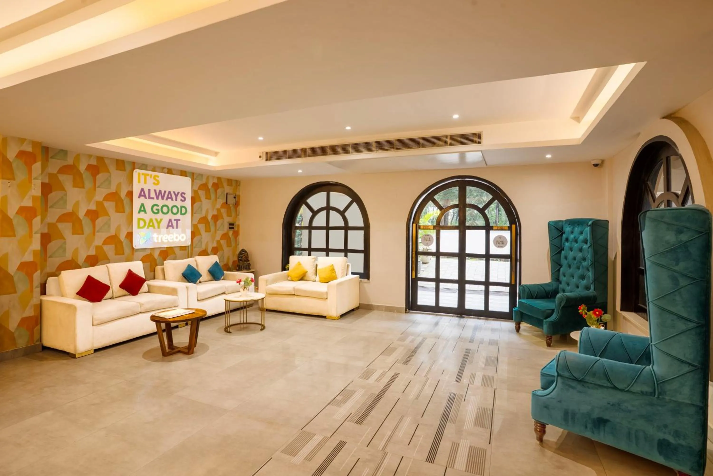 Seating area in Treebo Golden Leaf