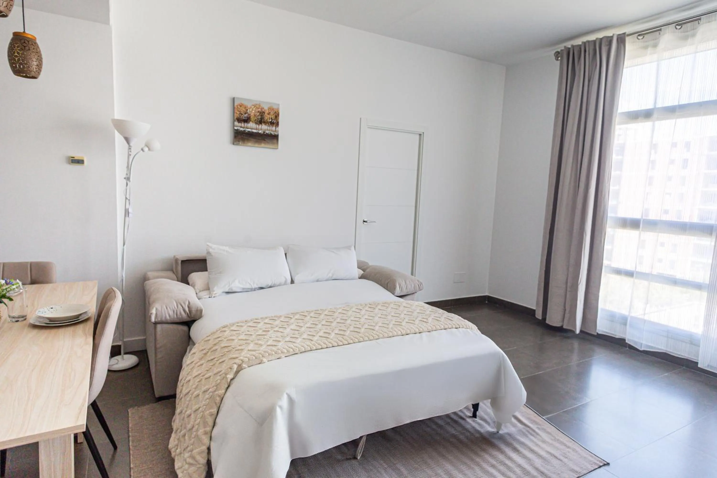 Living room, Bed in Maya Bay Suites