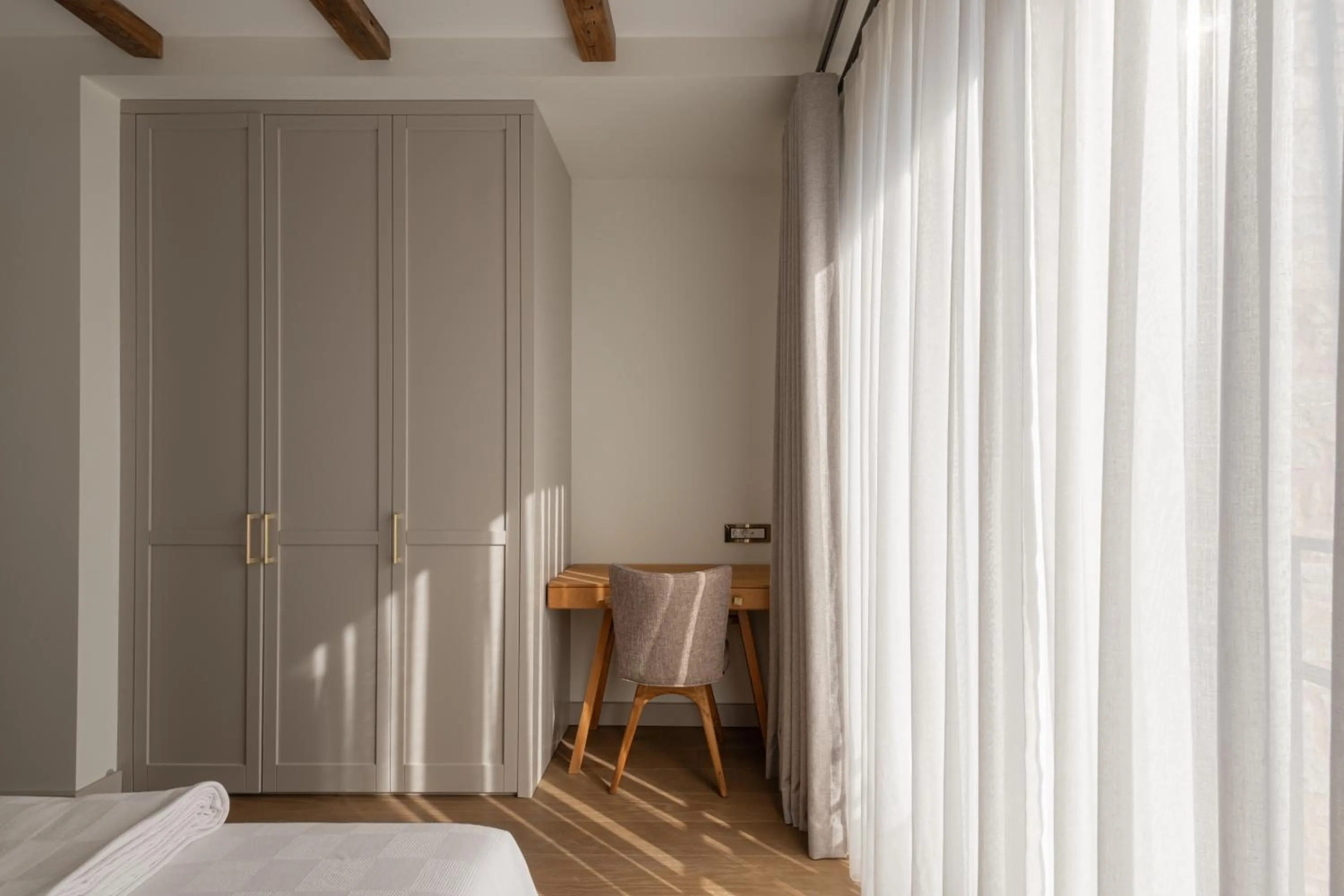 Bed in Mimosa Mansions