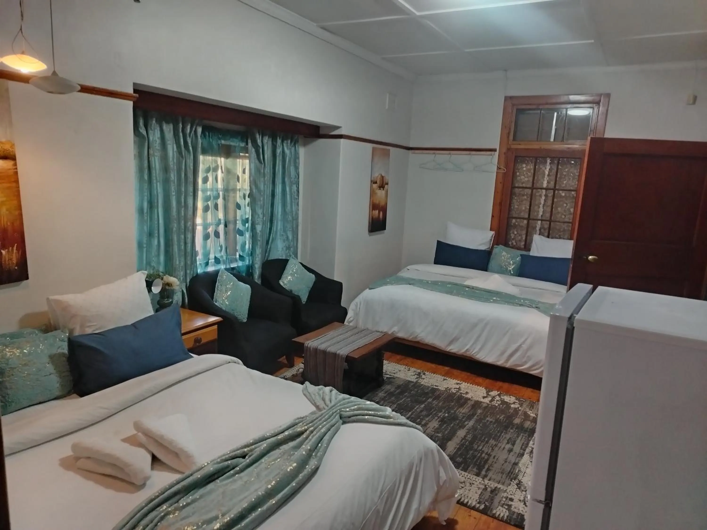 Bed in Brookyard Guest House