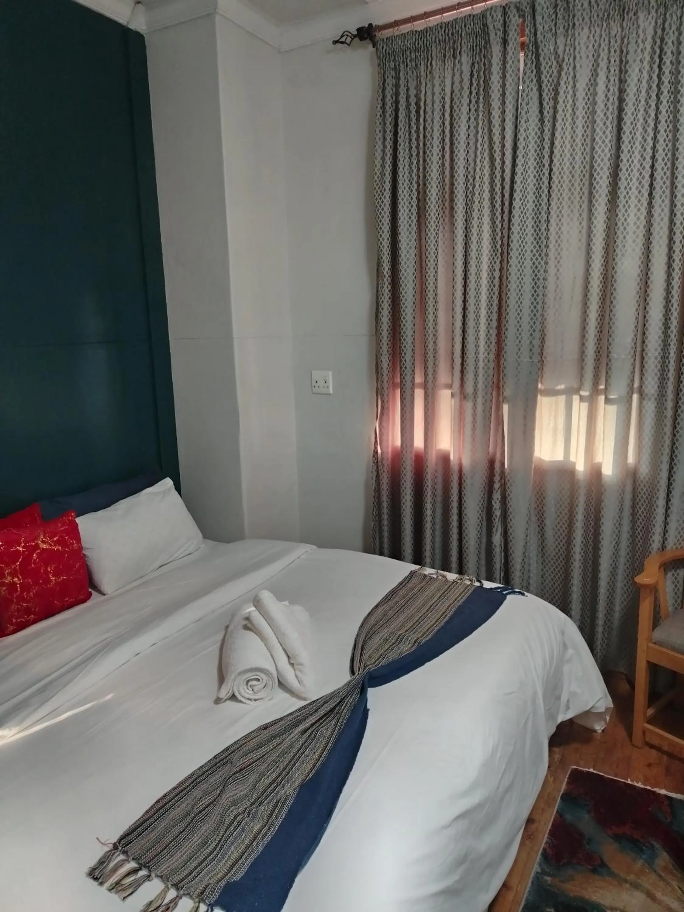 Bed in Brookyard Guest House