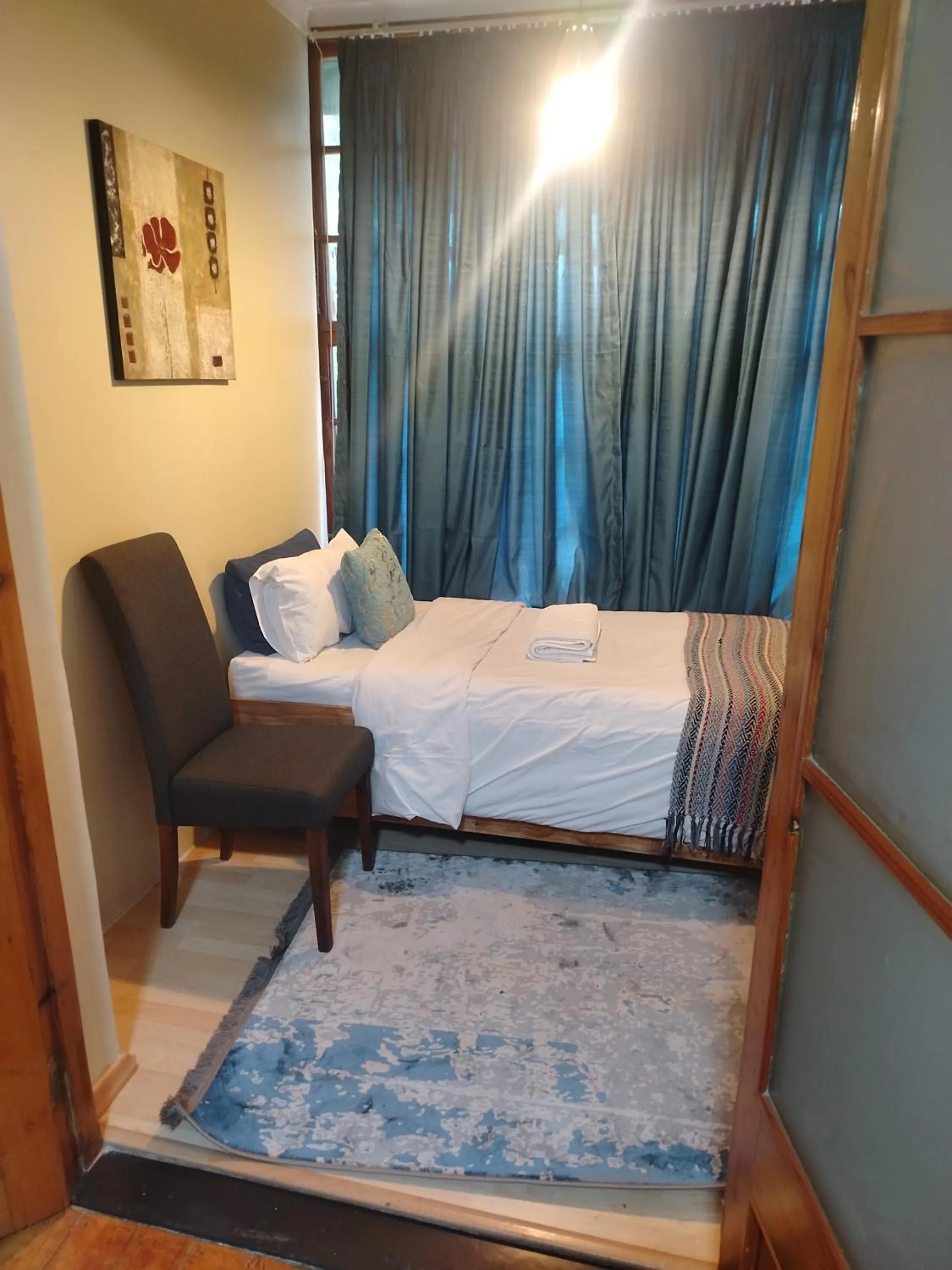 Bed in Brookyard Guest House