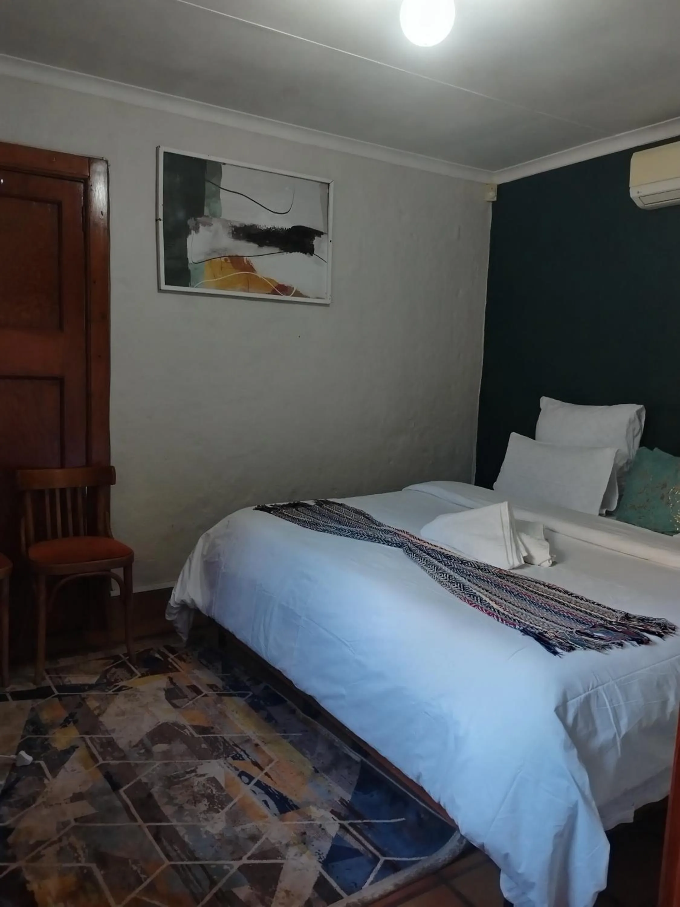 Bed in Brookyard Guest House