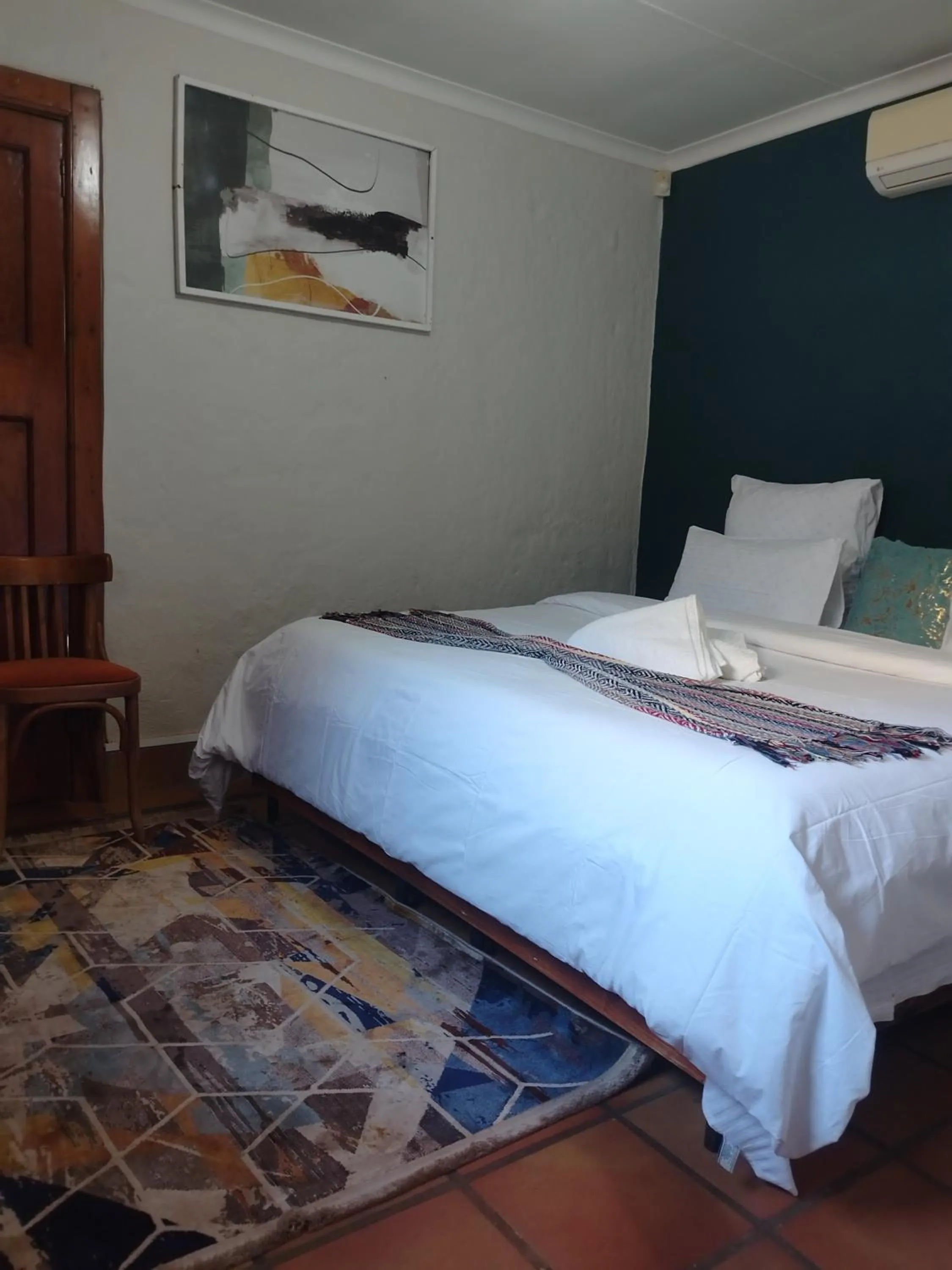 Bed in Brookyard Guest House