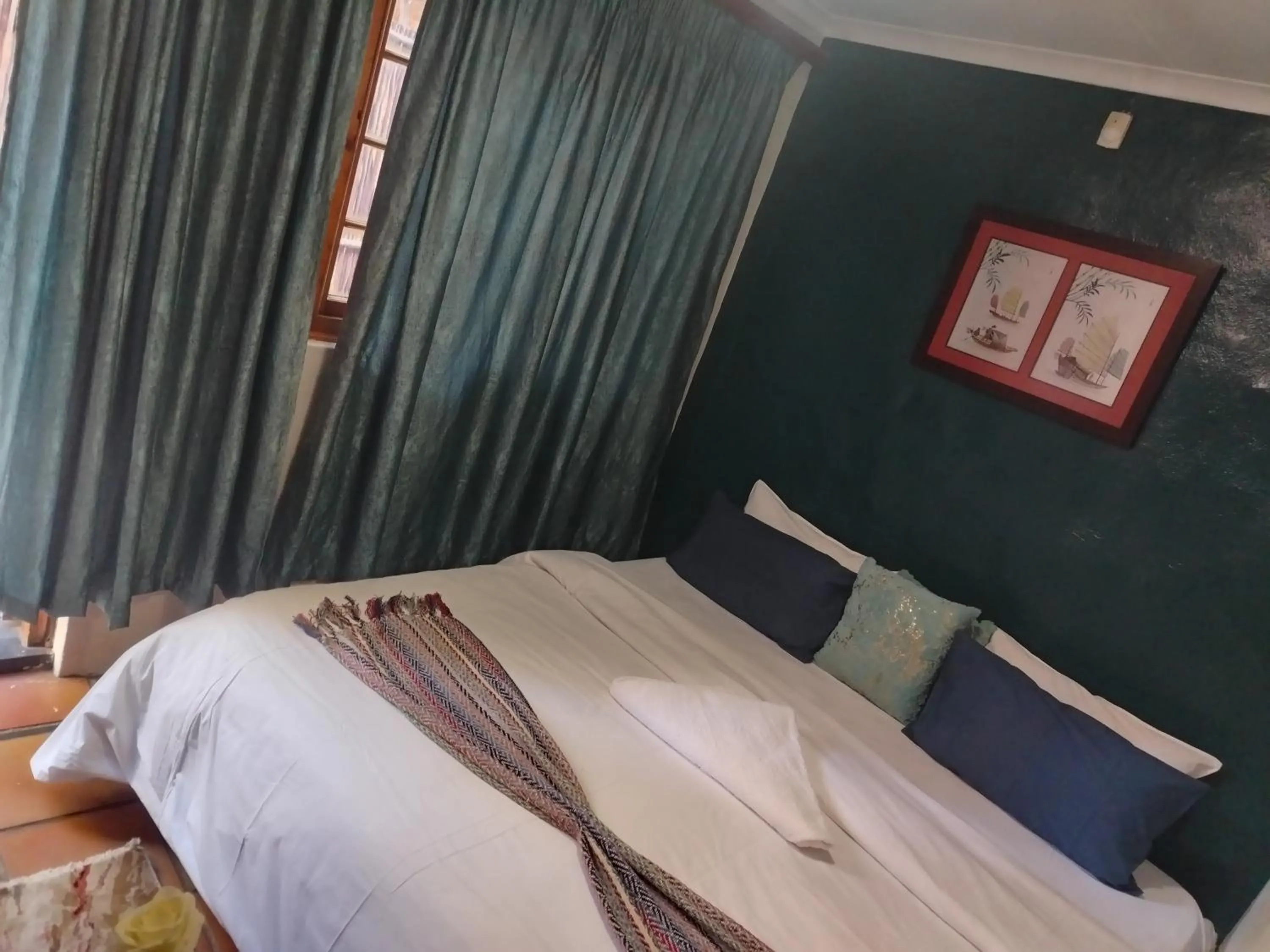 Bed in Brookyard Guest House