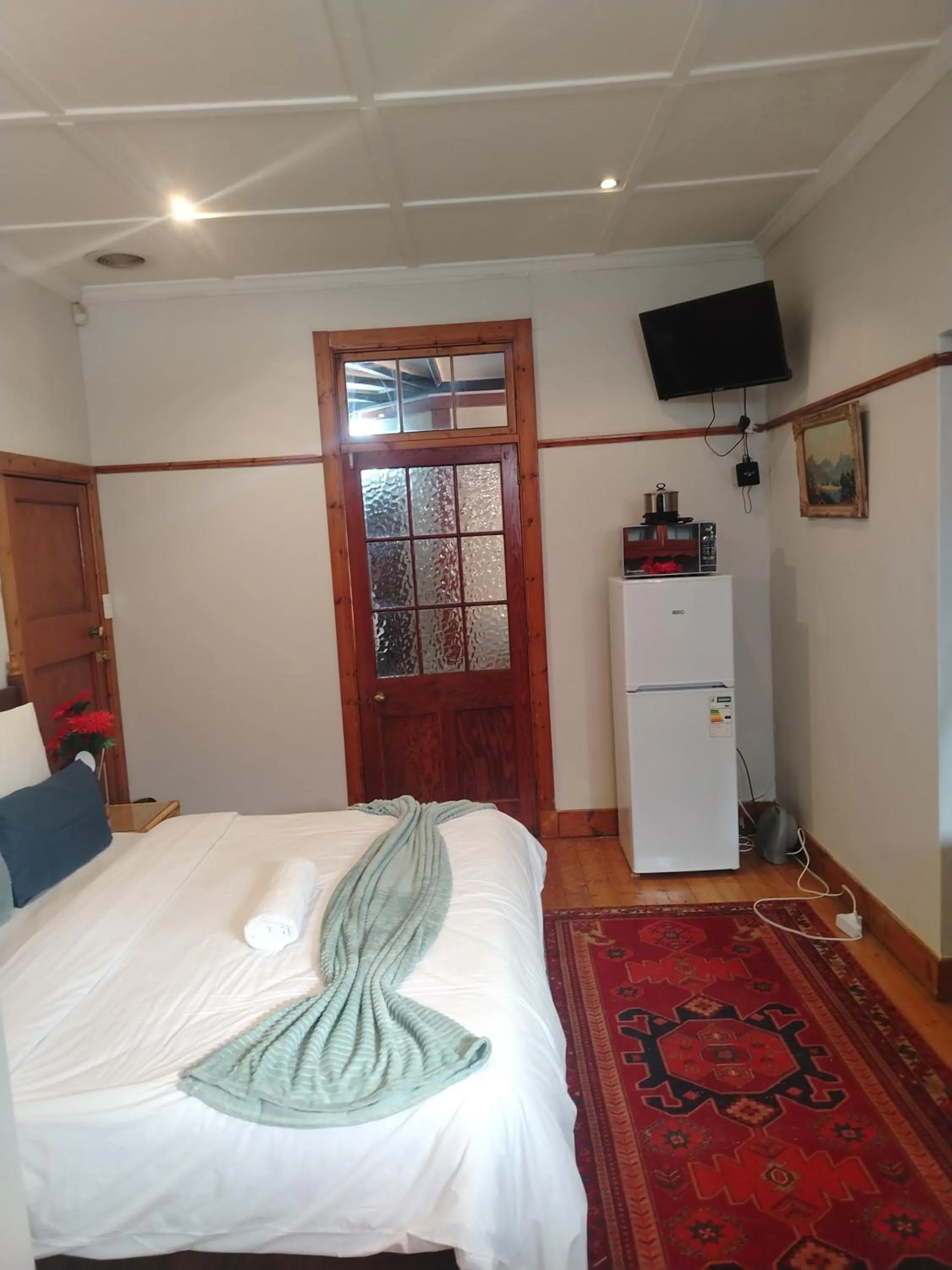Bed in Brookyard Guest House