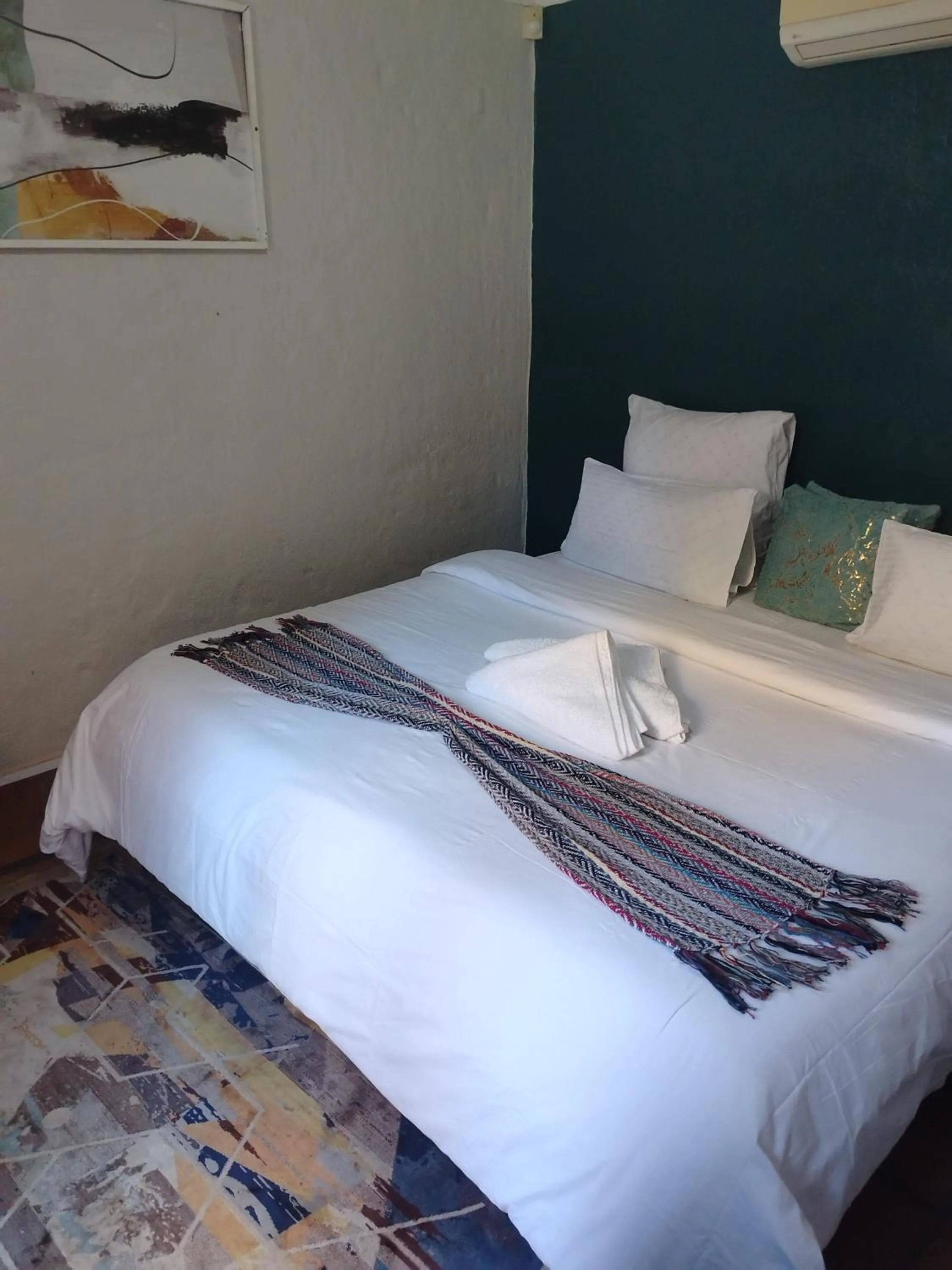 Bed in Brookyard Guest House