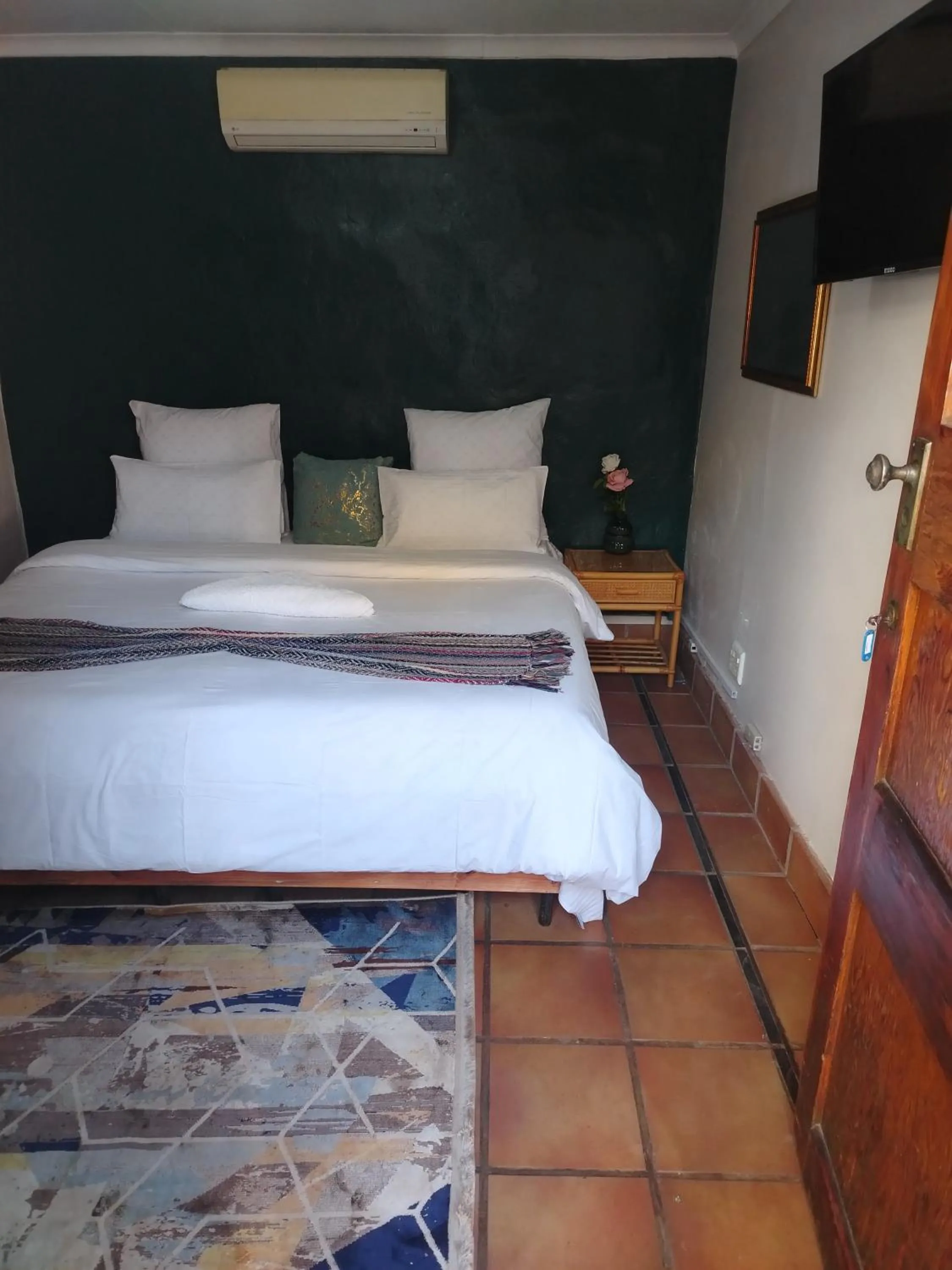Bed in Brookyard Guest House