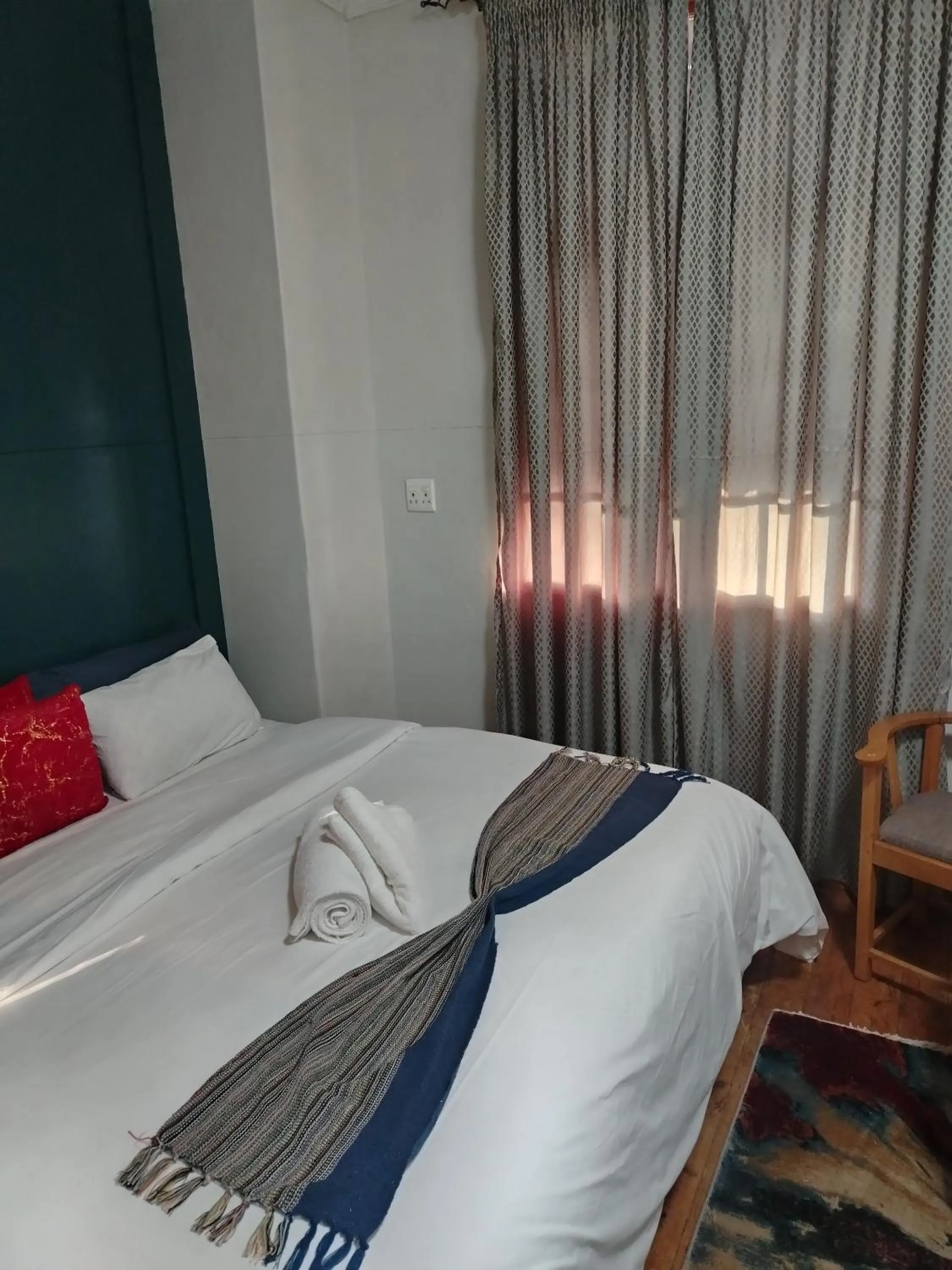 Bed in Brookyard Guest House